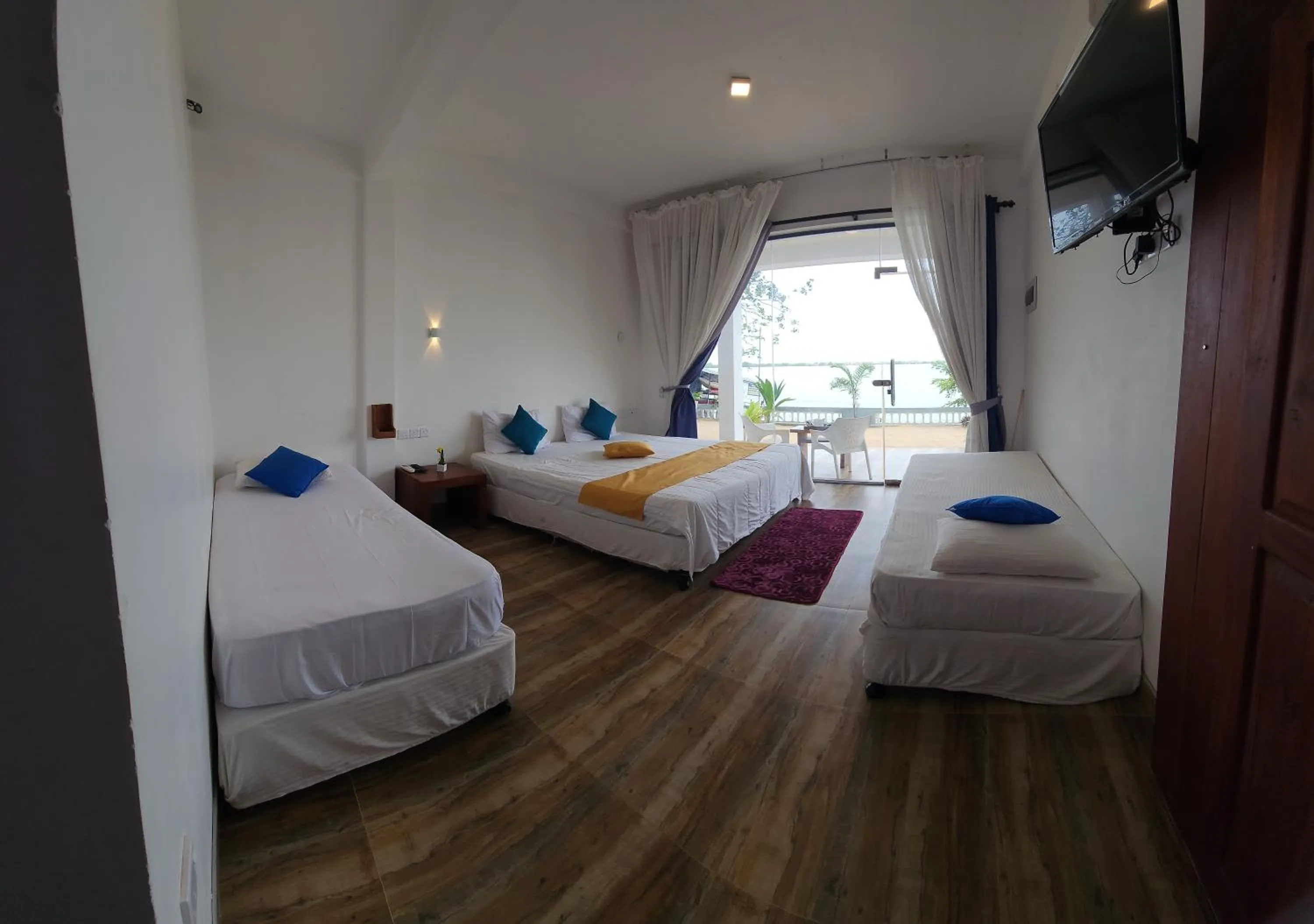 Photo of the whole room, Bed in Dinuda Lagoon Hotel