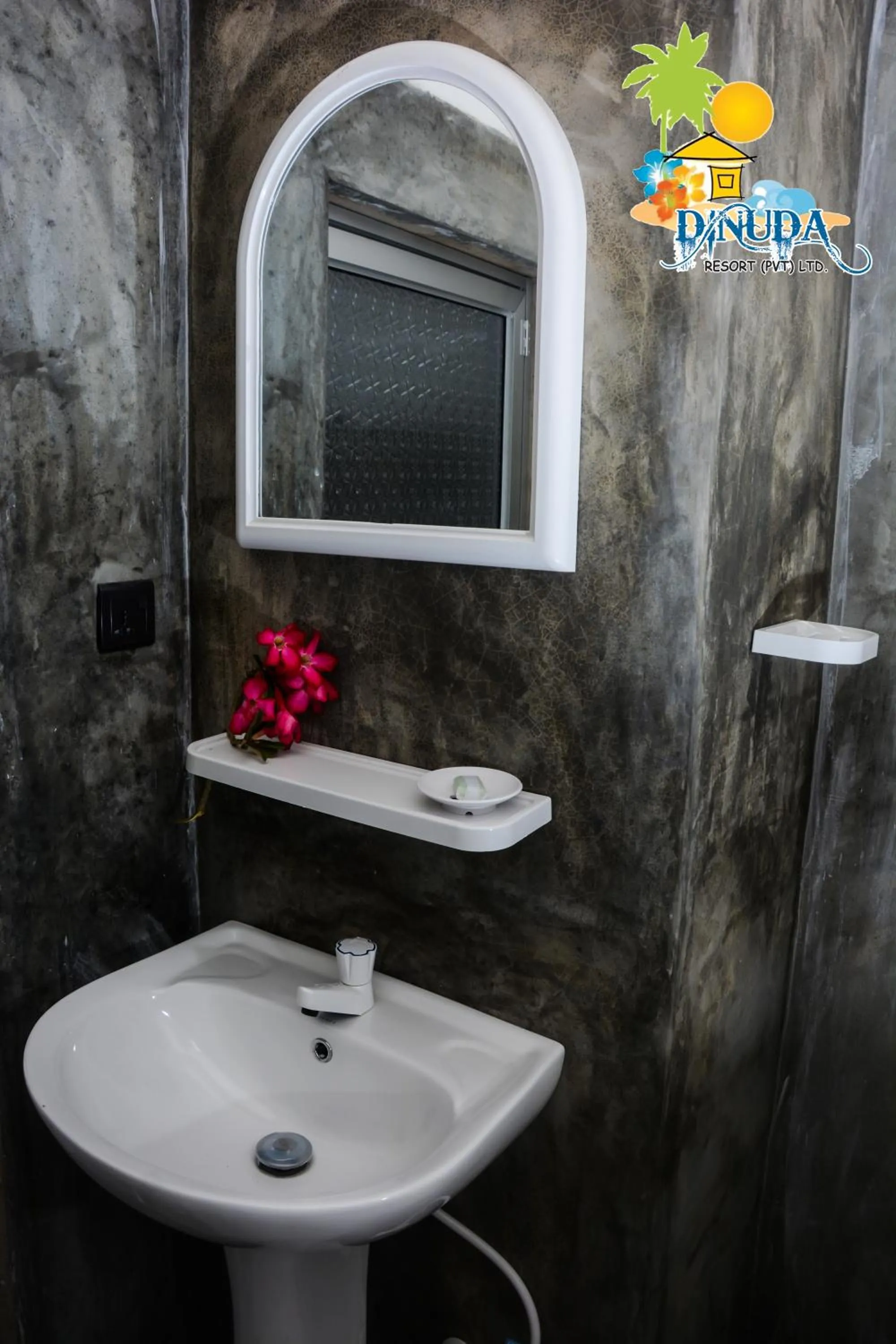 Bathroom in Dinuda Lagoon Hotel