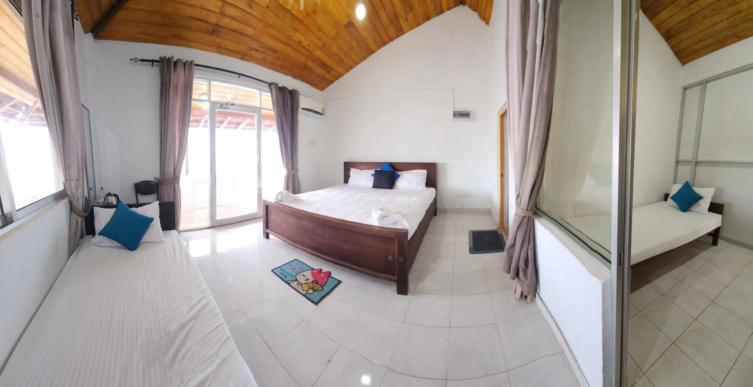 Photo of the whole room, Bed in Dinuda Lagoon Hotel
