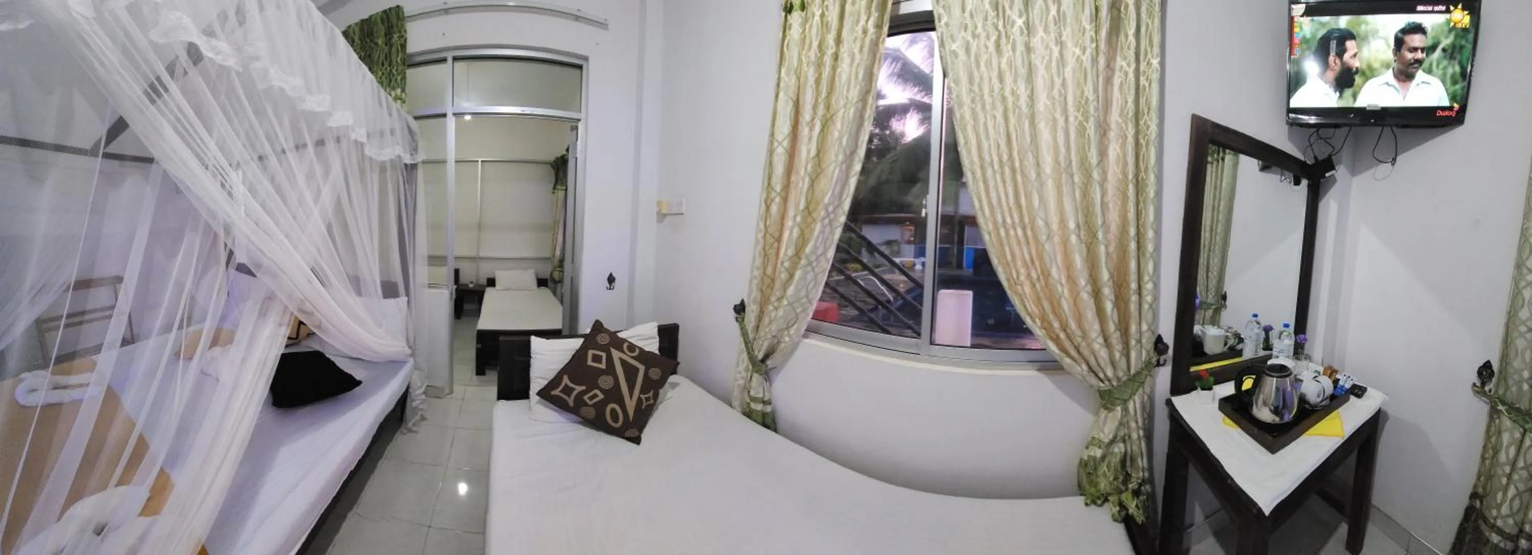 Bedroom in Dinuda Lagoon Hotel