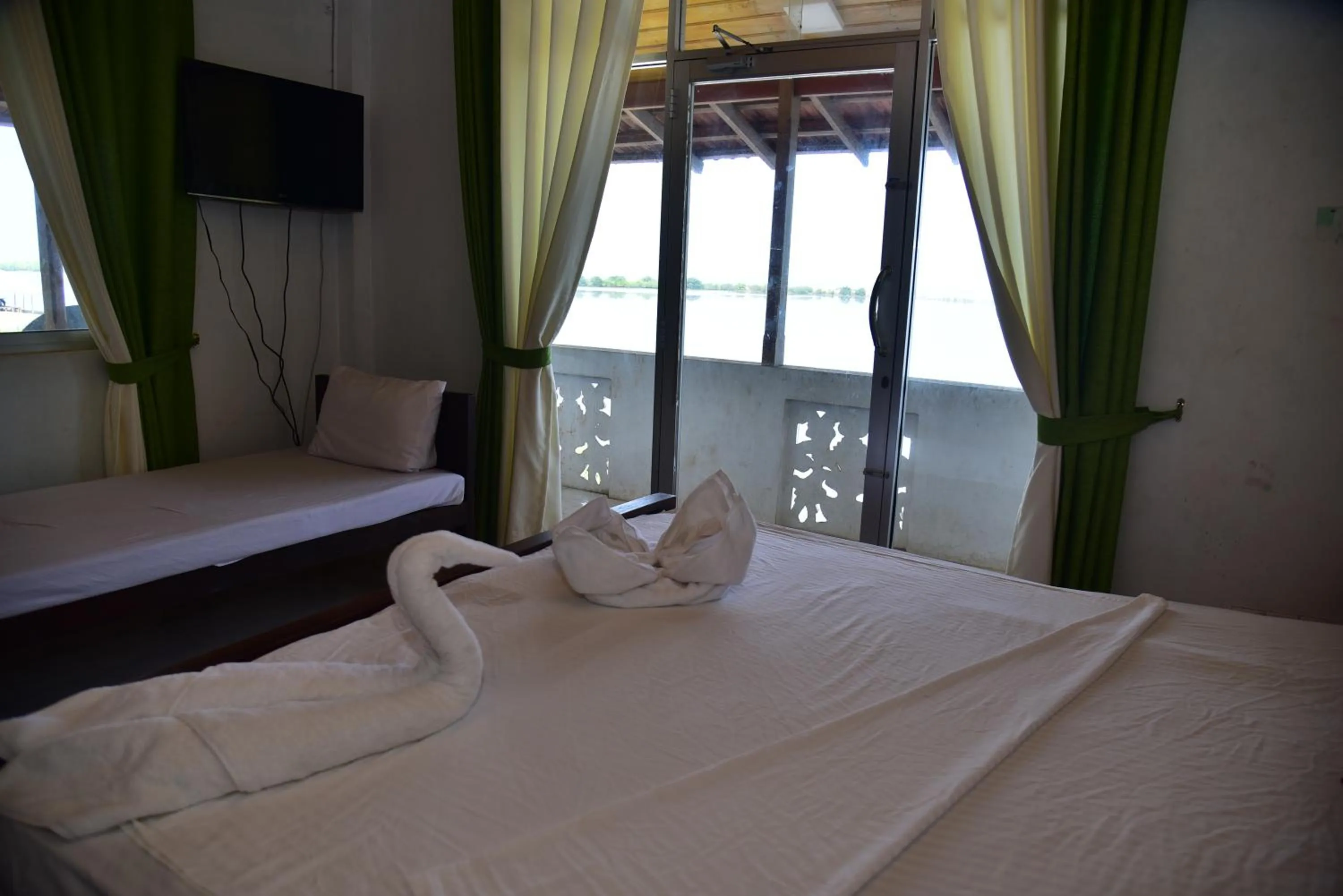 Bedroom, Bed in Dinuda Lagoon Hotel