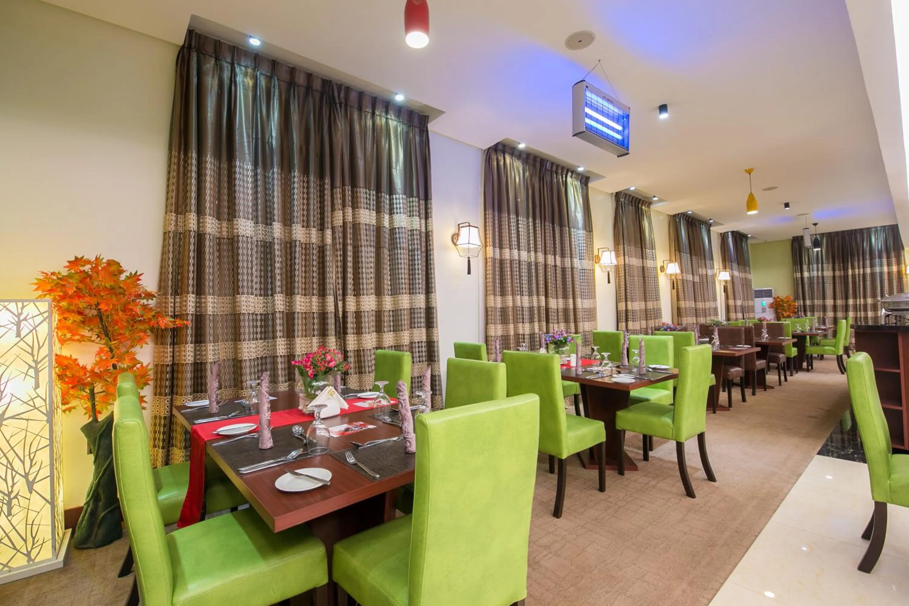 People in Grand Pela Hotel & Suites