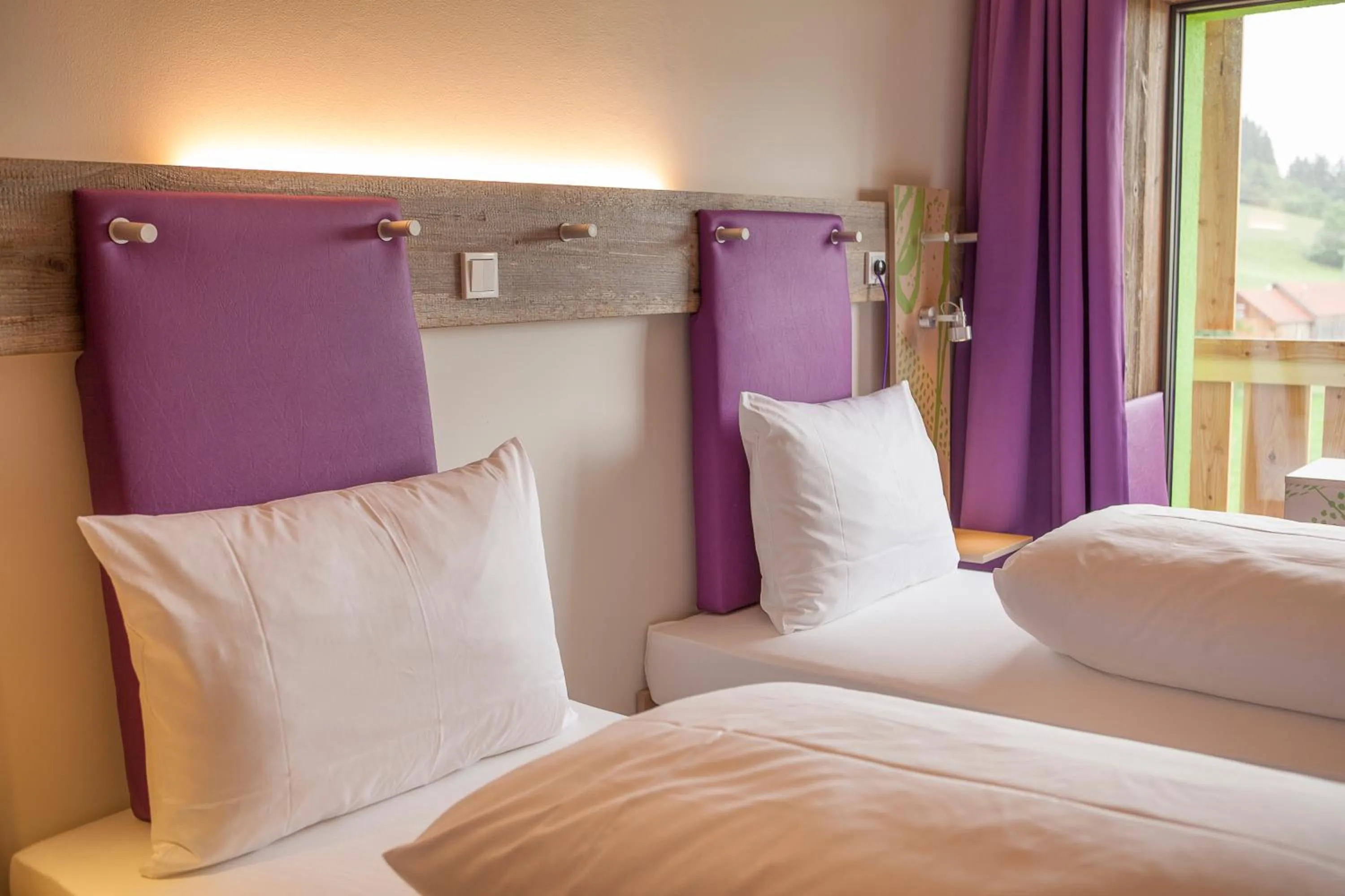 Bedroom, Bed in Explorer Hotel Zillertal