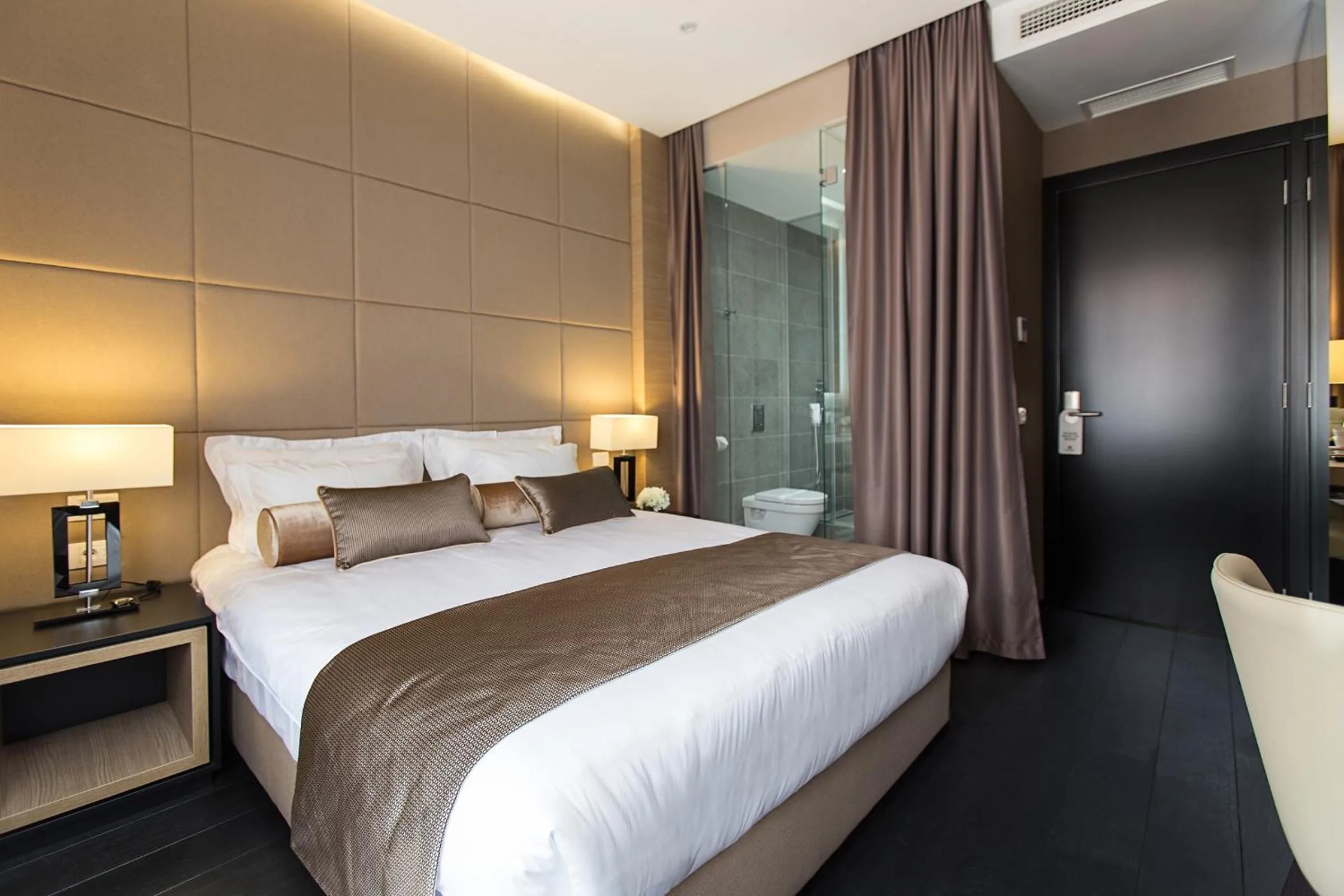 Photo of the whole room, Bed in Dominic Smart & Luxury Suites - Republic Square