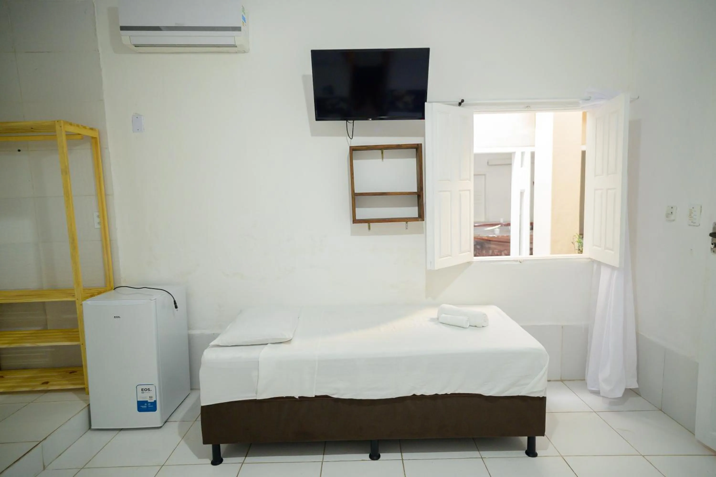 Bed in Pousada Pimenta Nativa