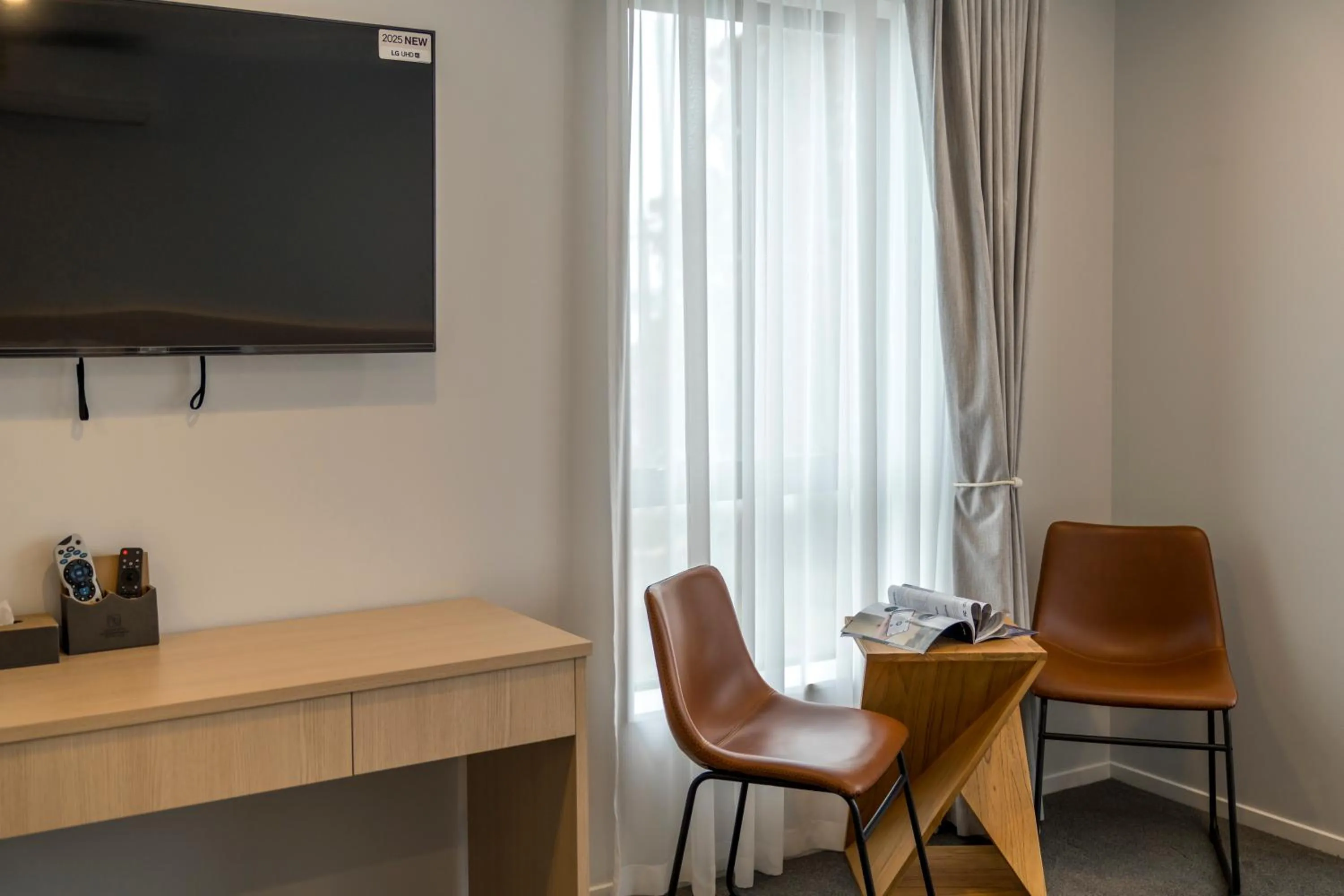 Seating area in Takapuna International Motor Lodge