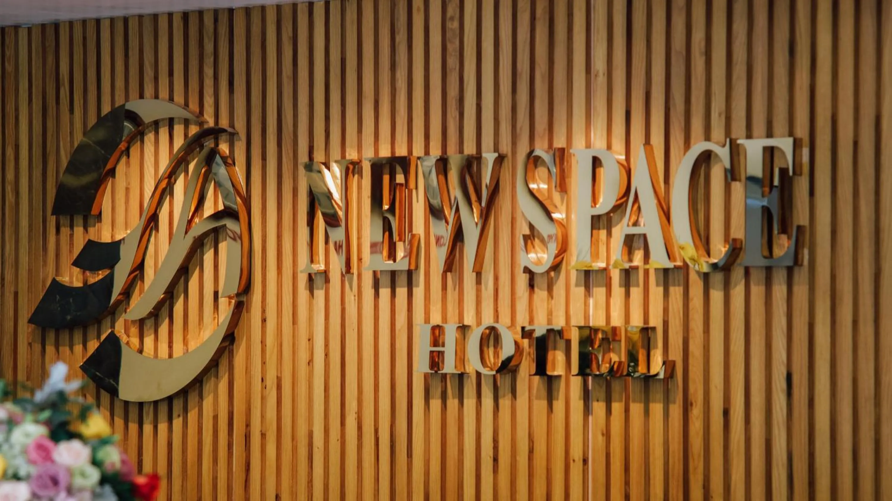 Property logo or sign in New Space Hotel Airport