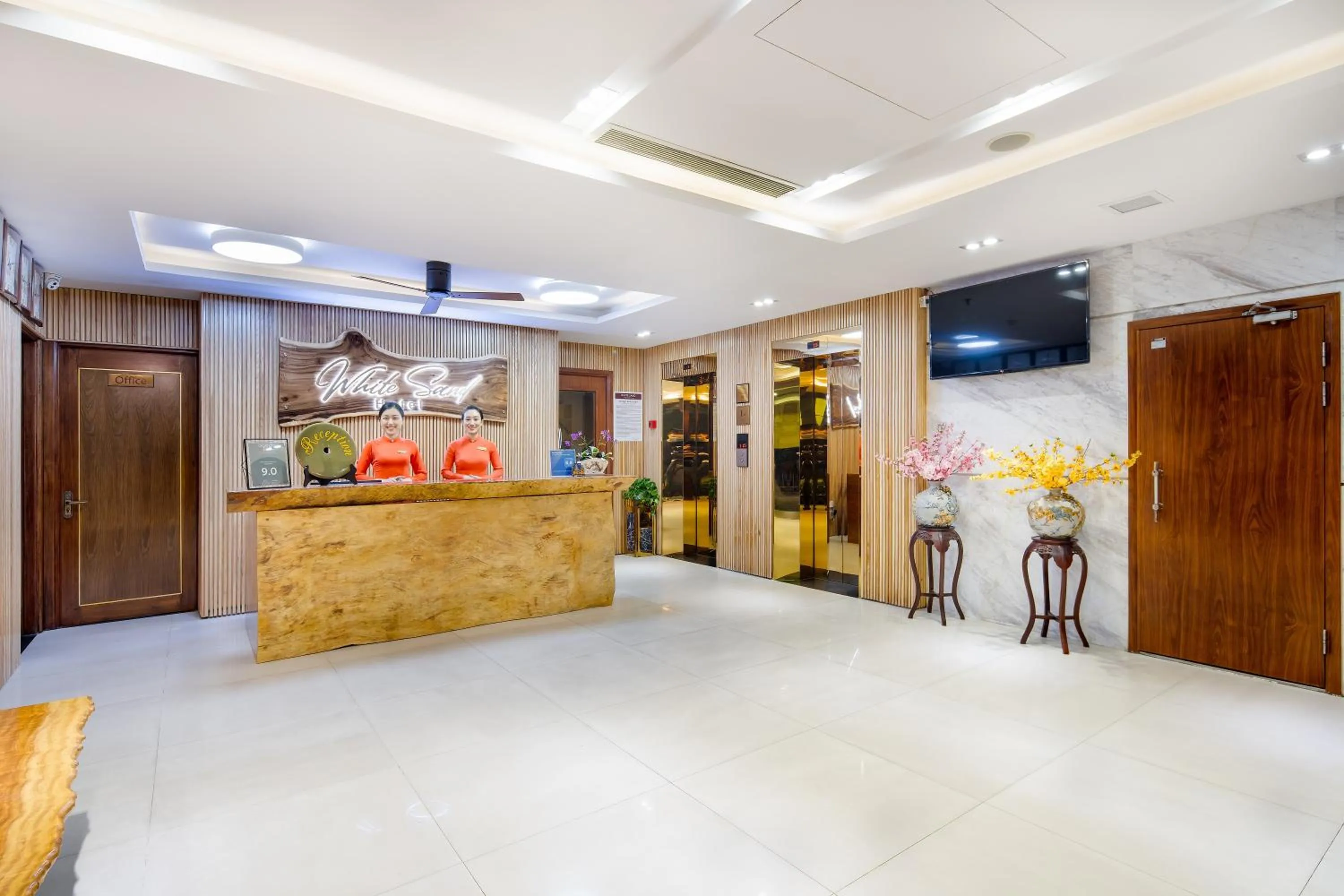 Property logo or sign in White Sand Boutique Hotel