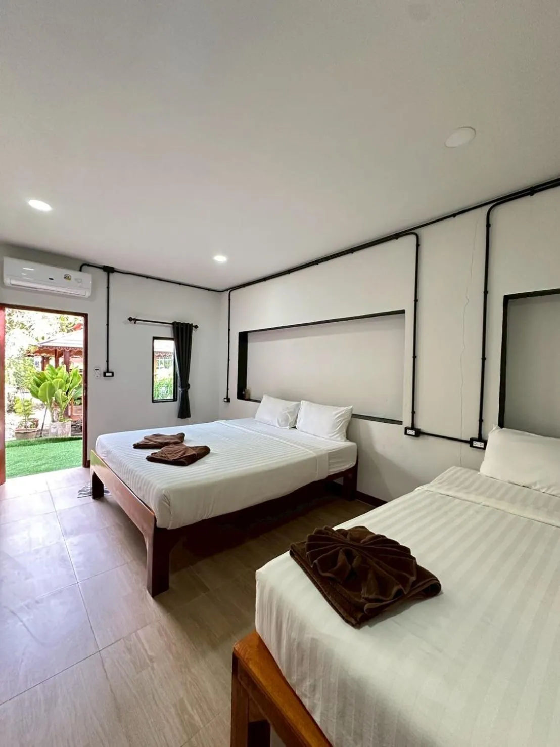 Bed in Klongdao Sunset Villa