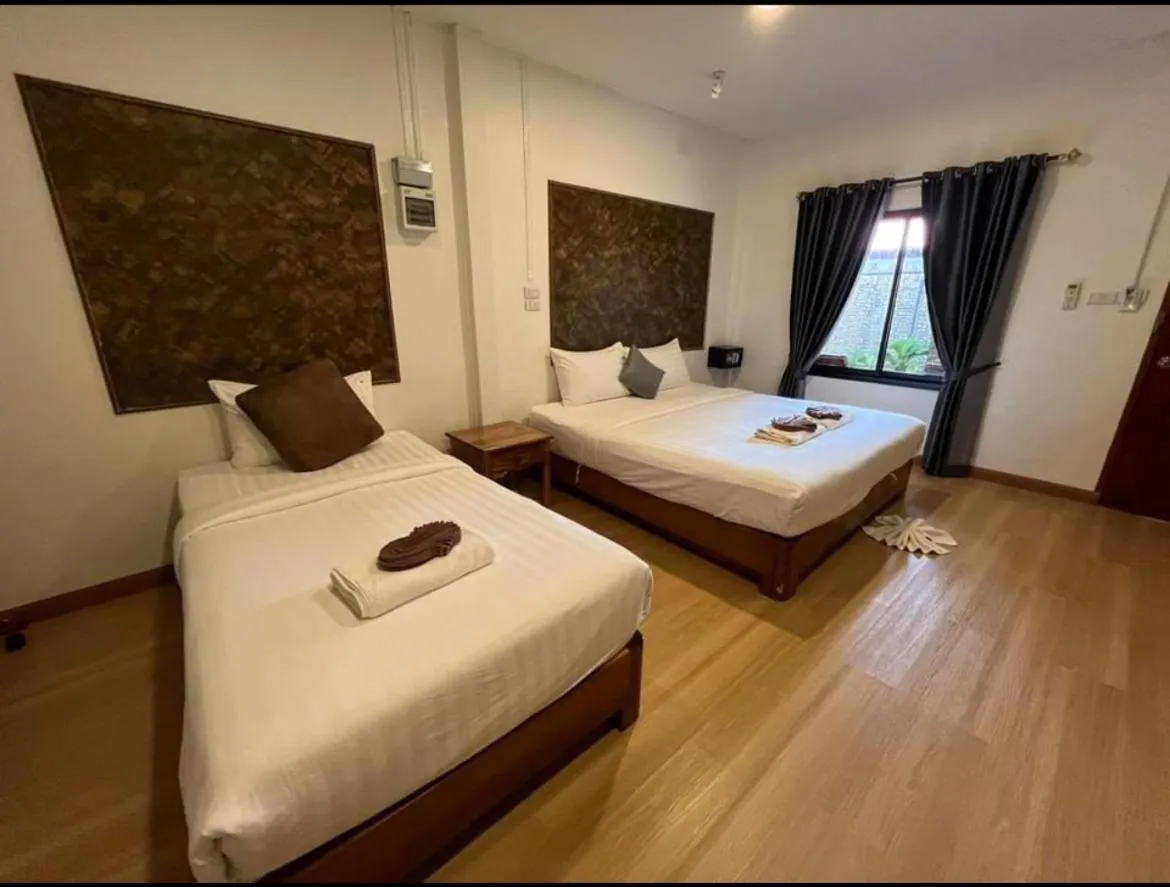 Bed in Klongdao Sunset Villa