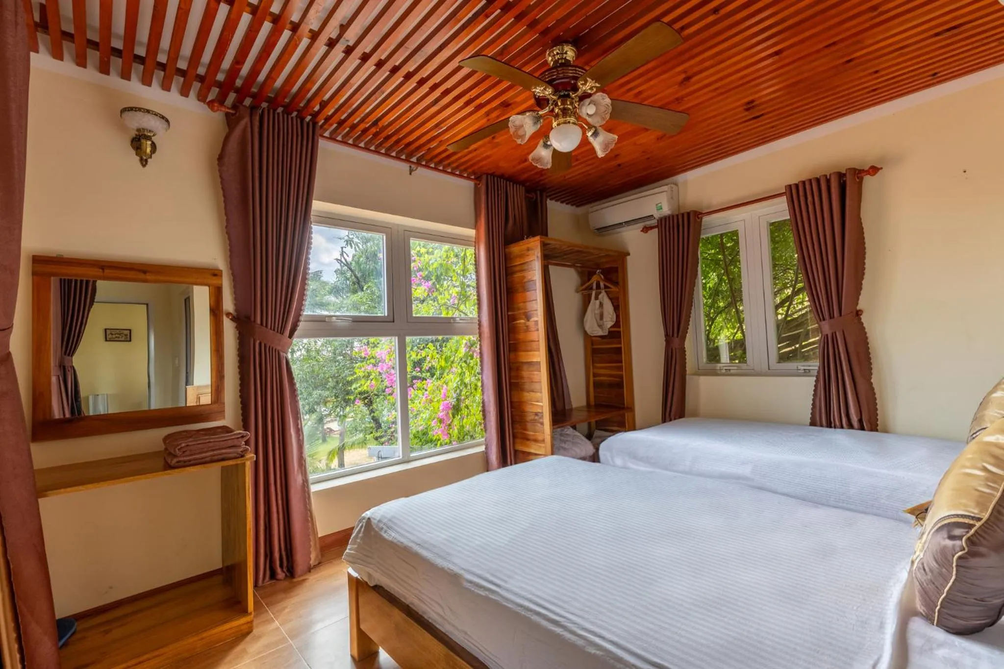 Bed in Mango Beach Resort