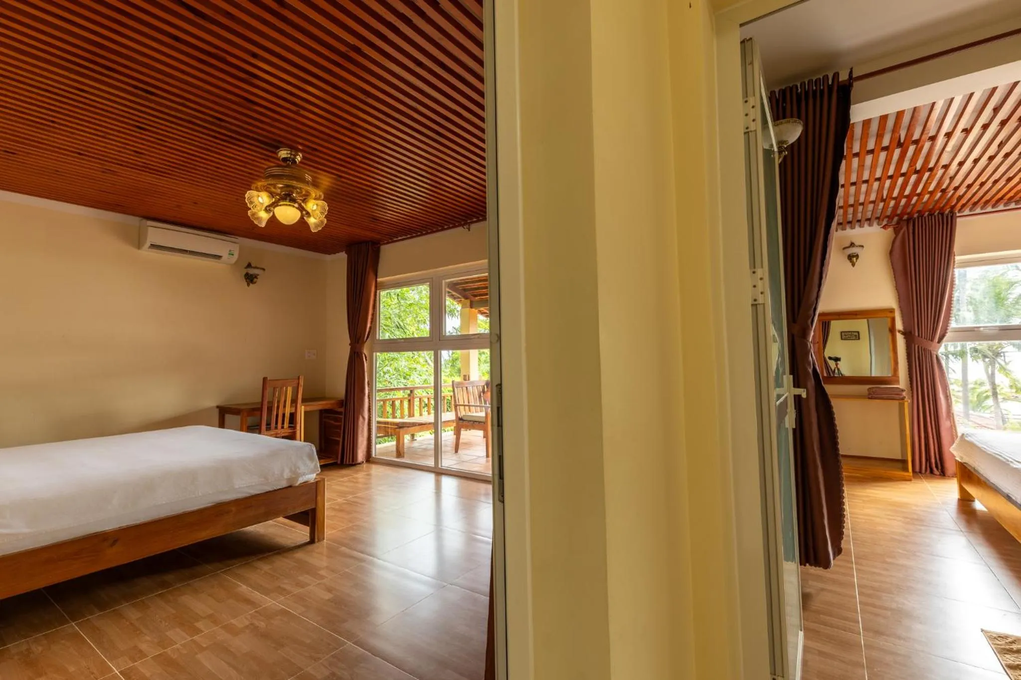 Bed in Mango Beach Resort