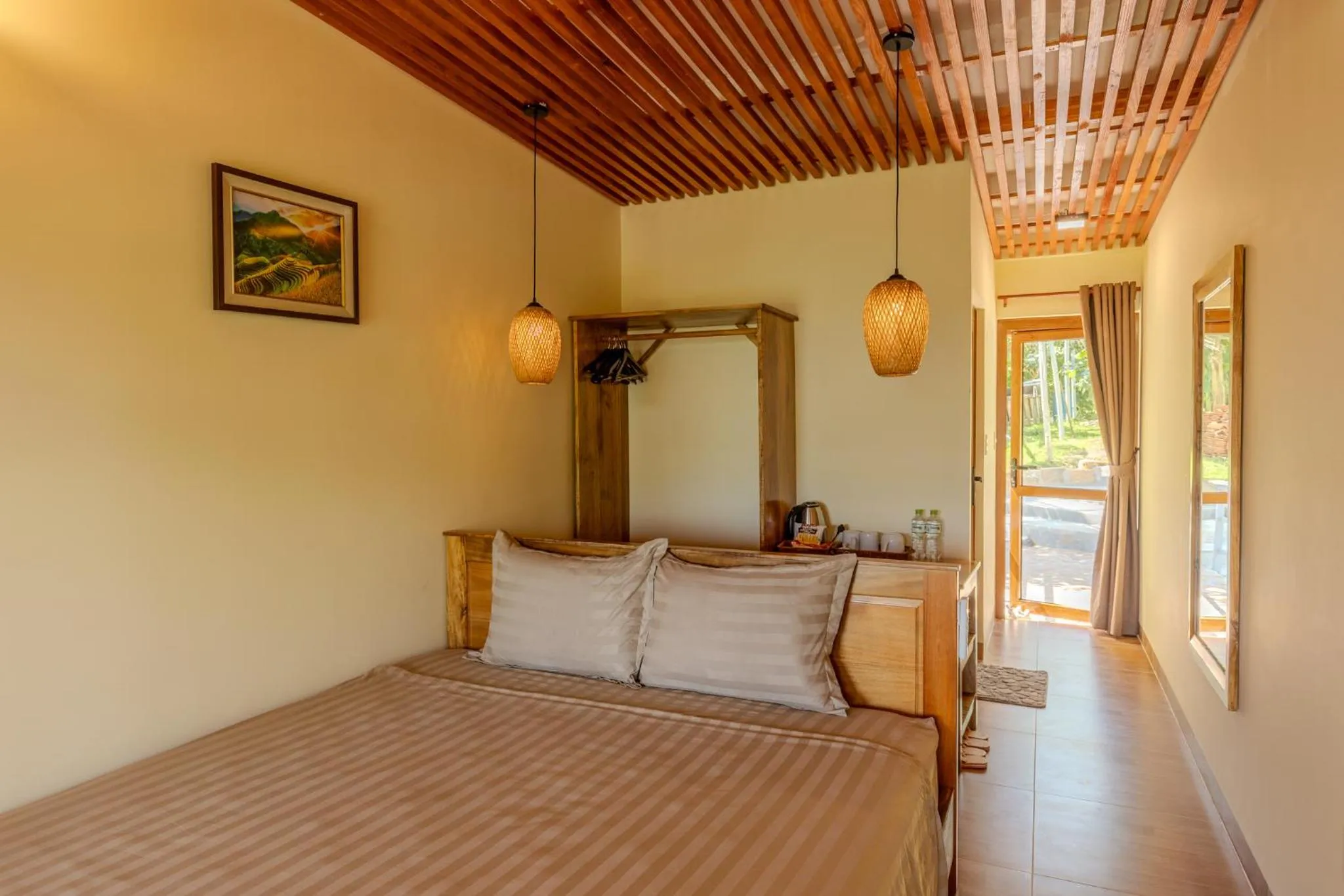 Bed in Mango Beach Resort