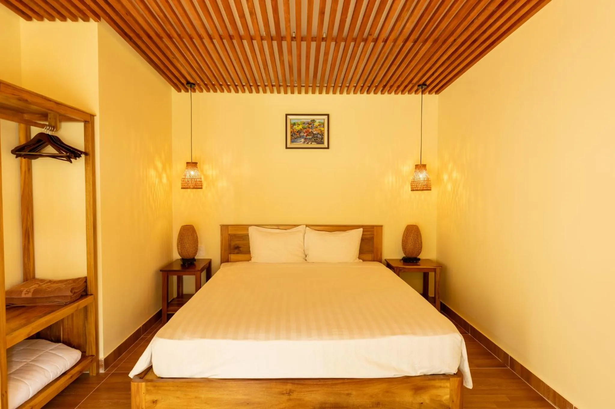 Bed in Mango Beach Resort
