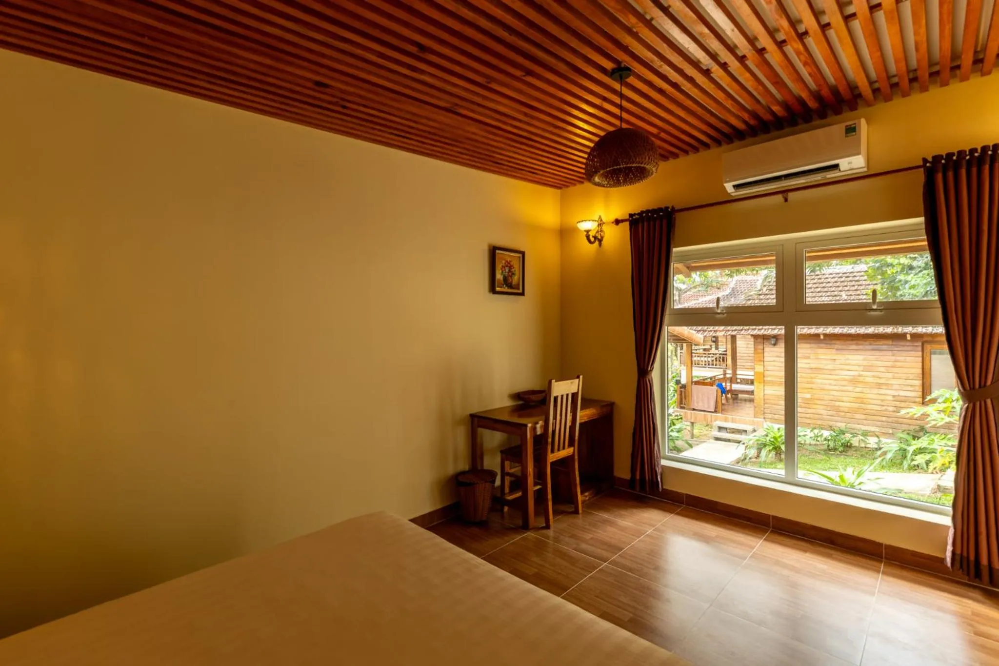 Bed in Mango Beach Resort