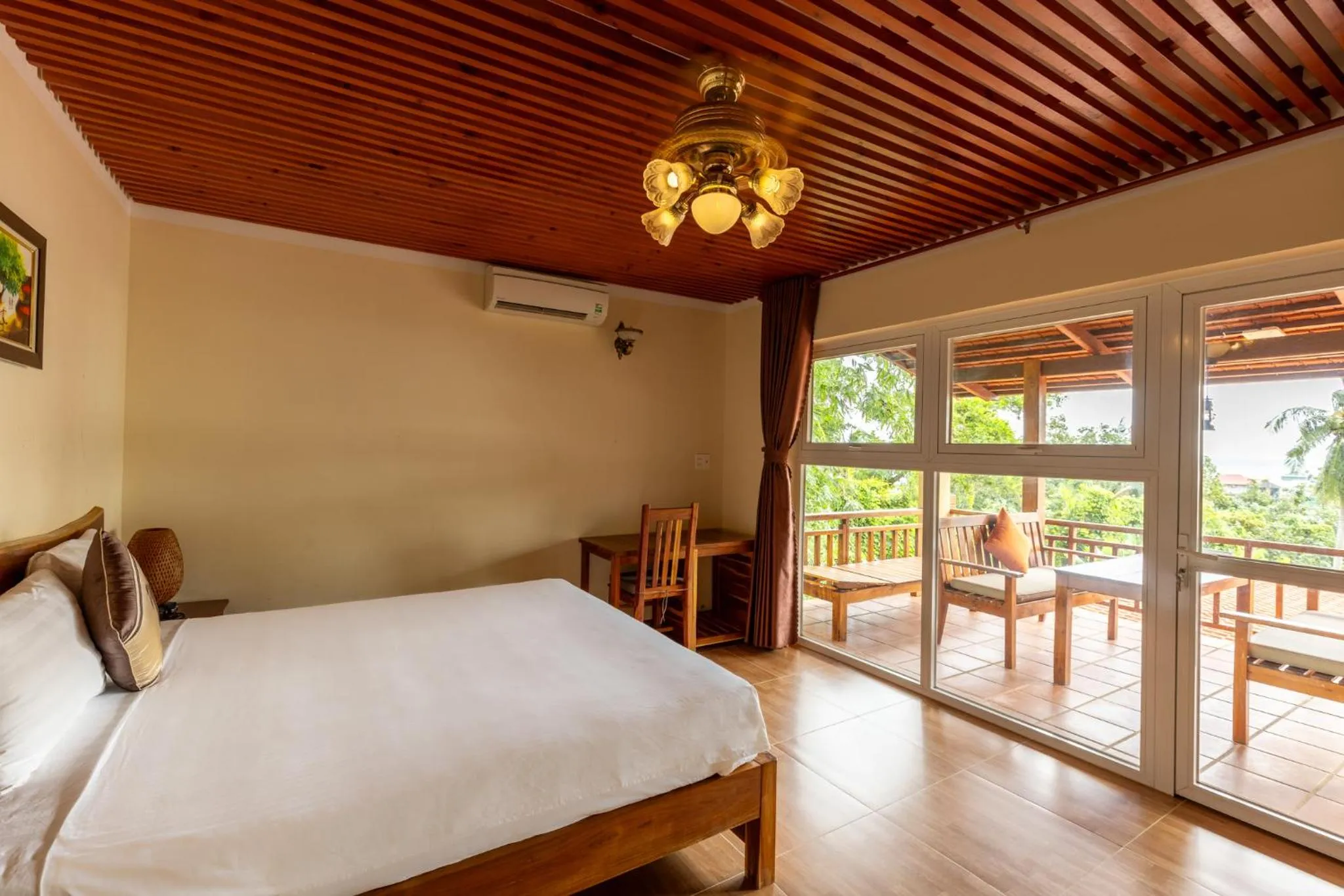 Bed in Mango Beach Resort