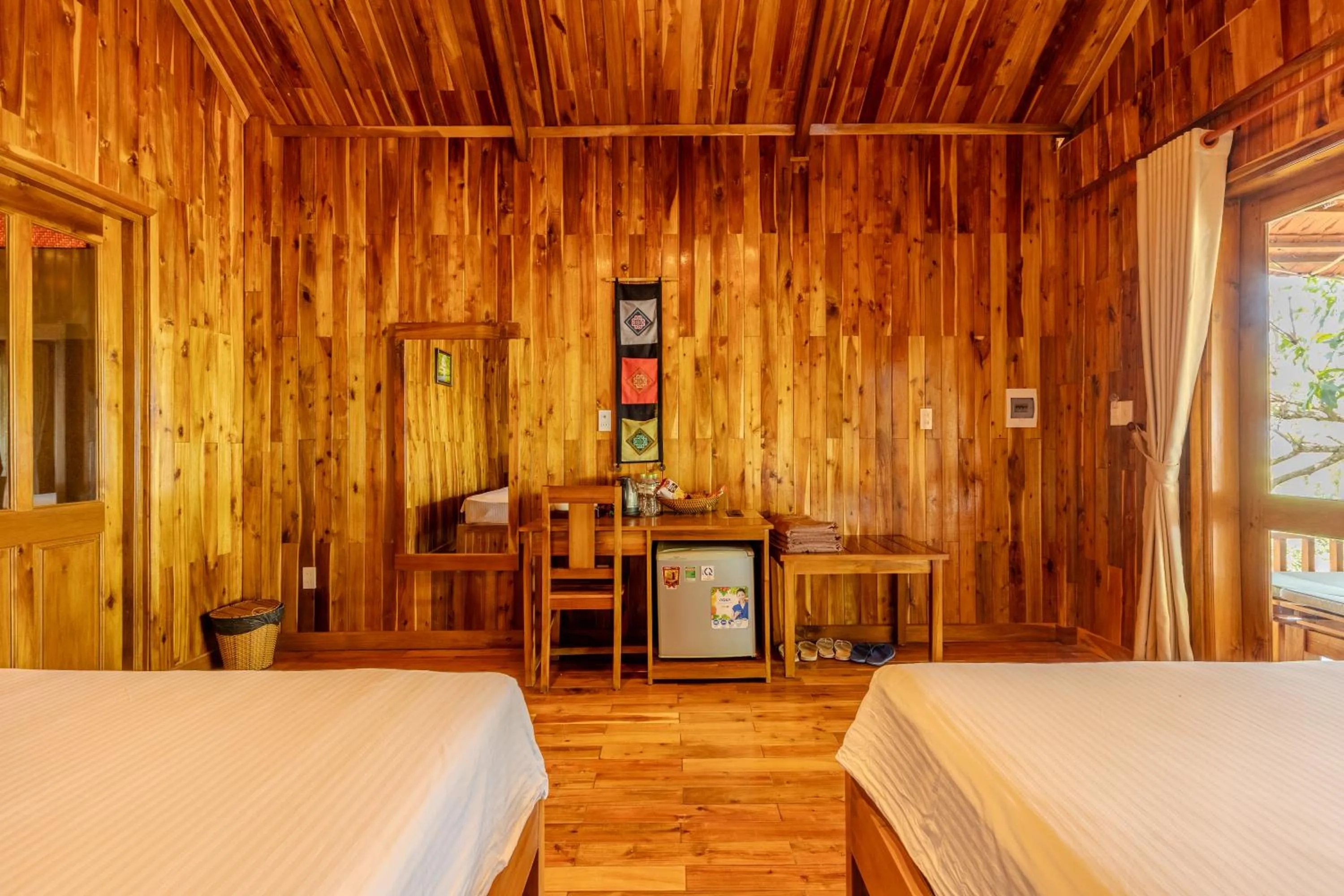 Bed in Mango Beach Resort