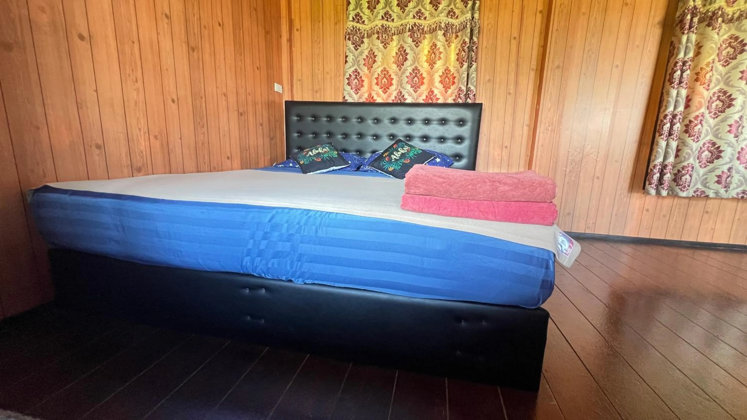 Bed in Chom Dao Resort