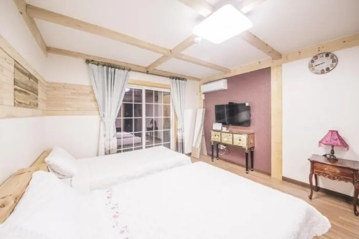 Bed in Red Windmill Pension