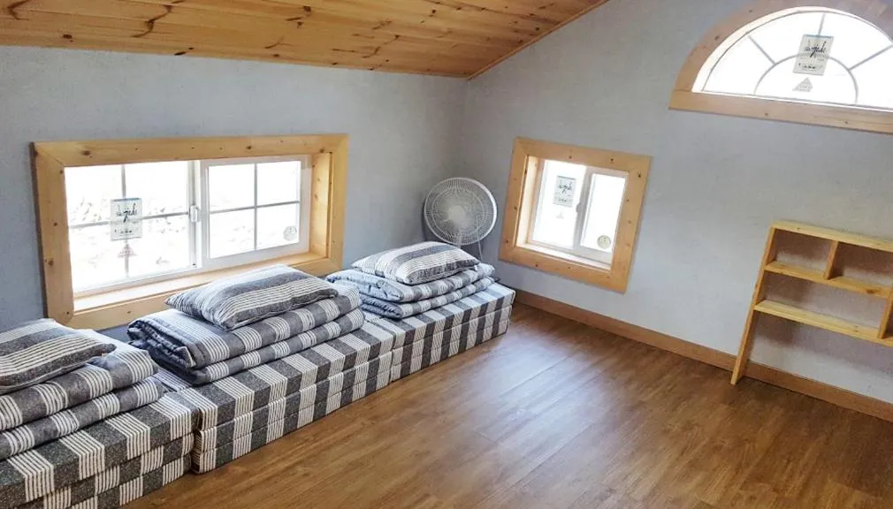 Bed in Red Windmill Pension