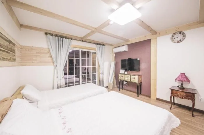 Bed in Red Windmill Pension