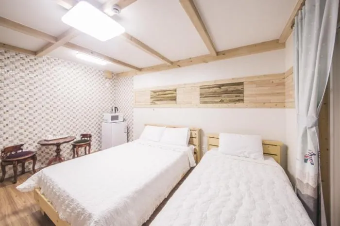 Bed in Red Windmill Pension