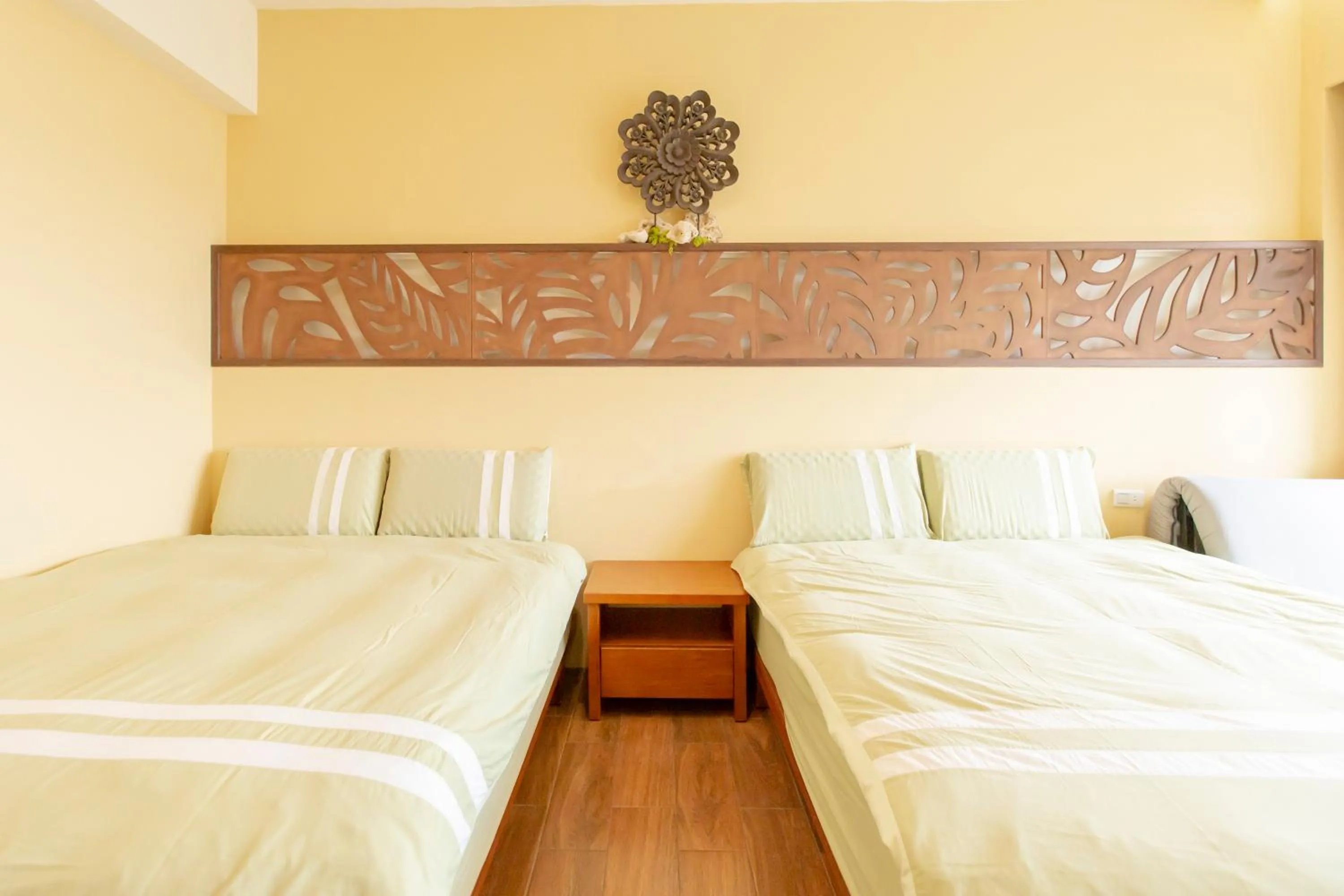 Bed in 龍家民宿 The Laid-back Dragon Lodge