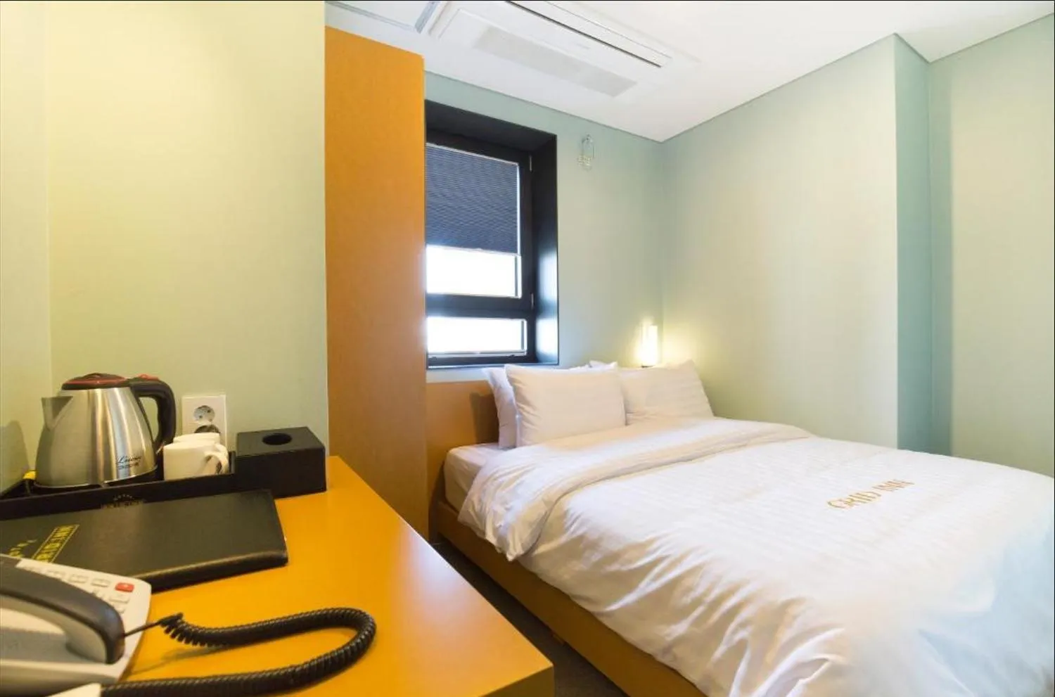 Bedroom, Bed in Grid Inn Hotel