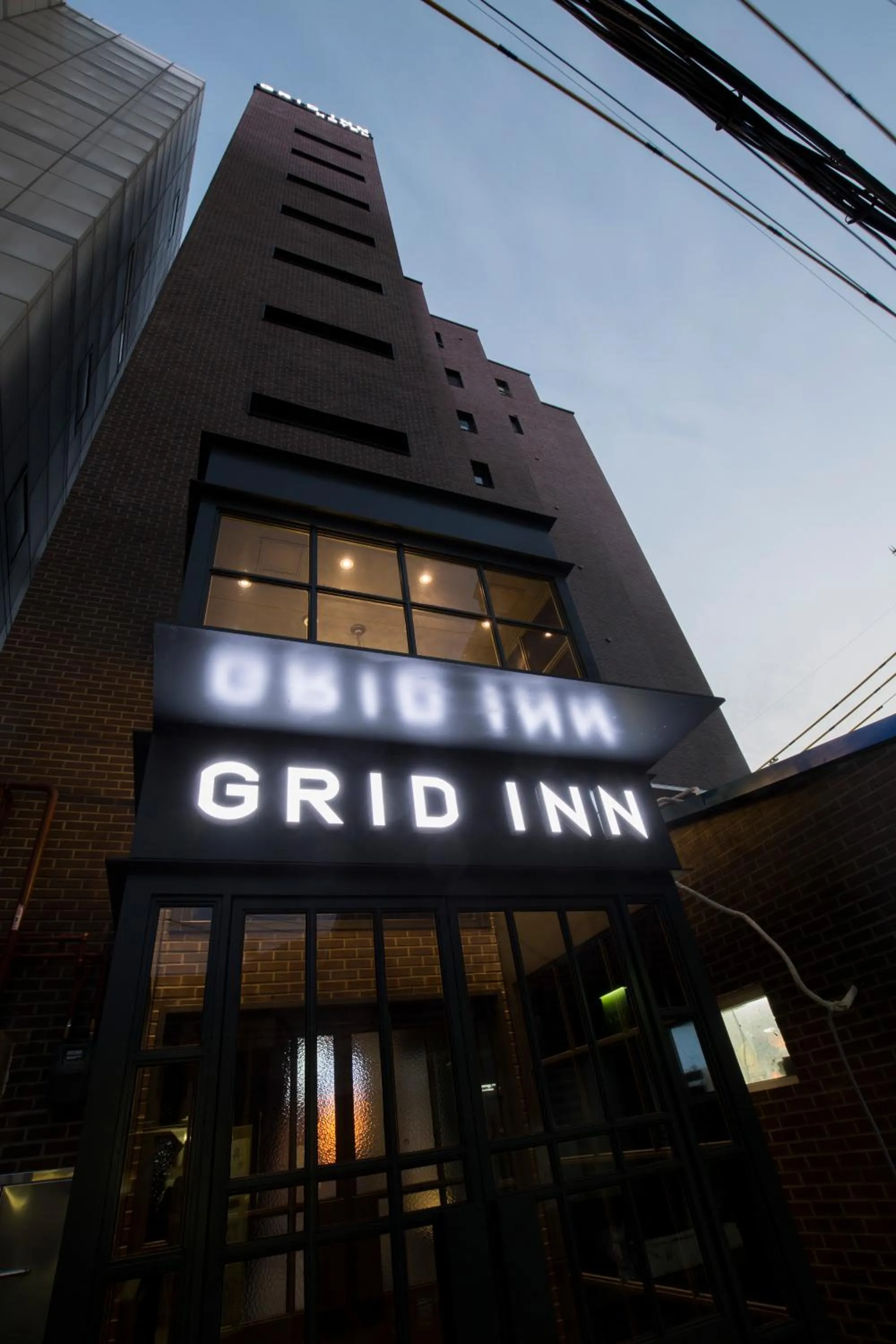 Facade/entrance in Grid Inn Hotel
