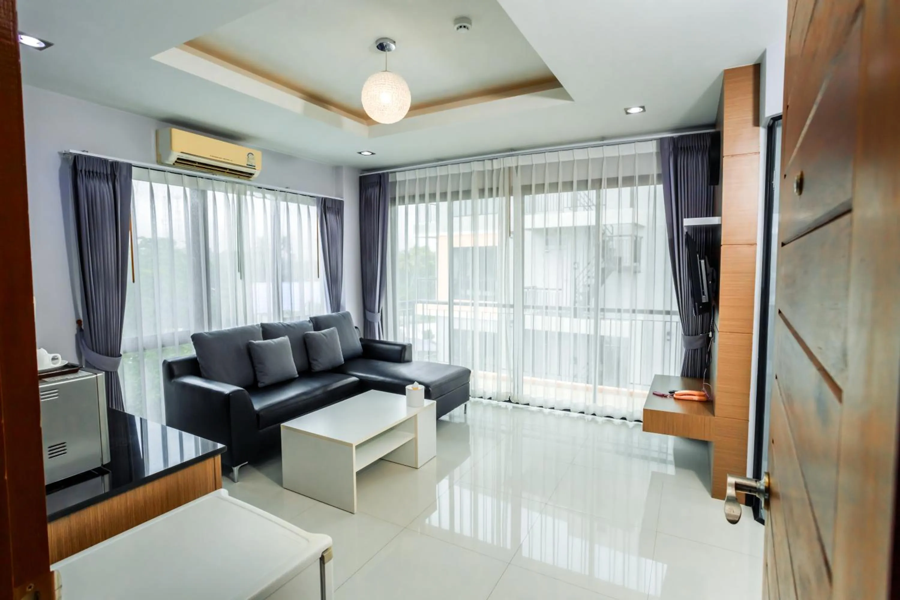 Communal lounge/ TV room in The Lucky Beach Ao Nang