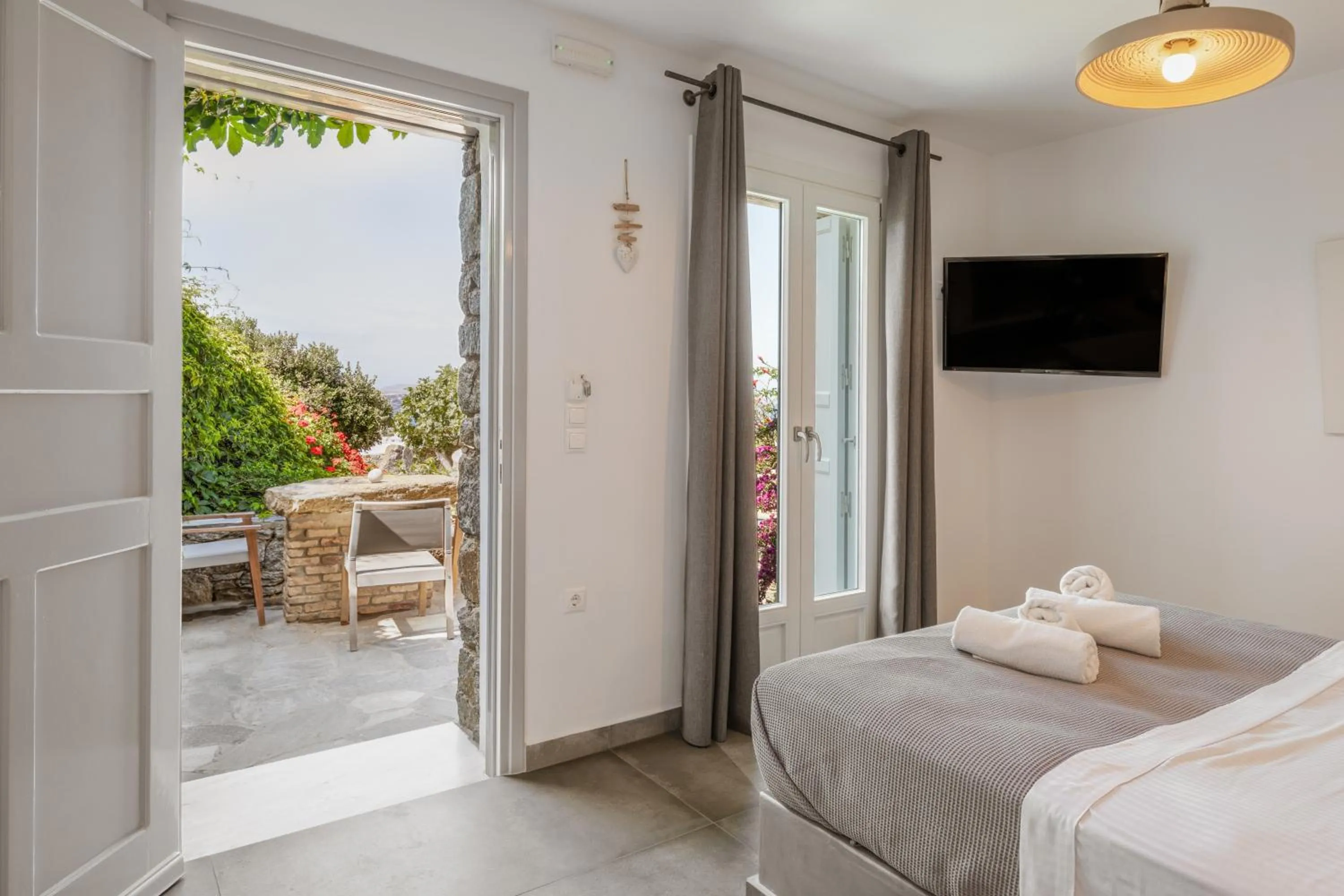 Bed in Aletro Cottage Houses