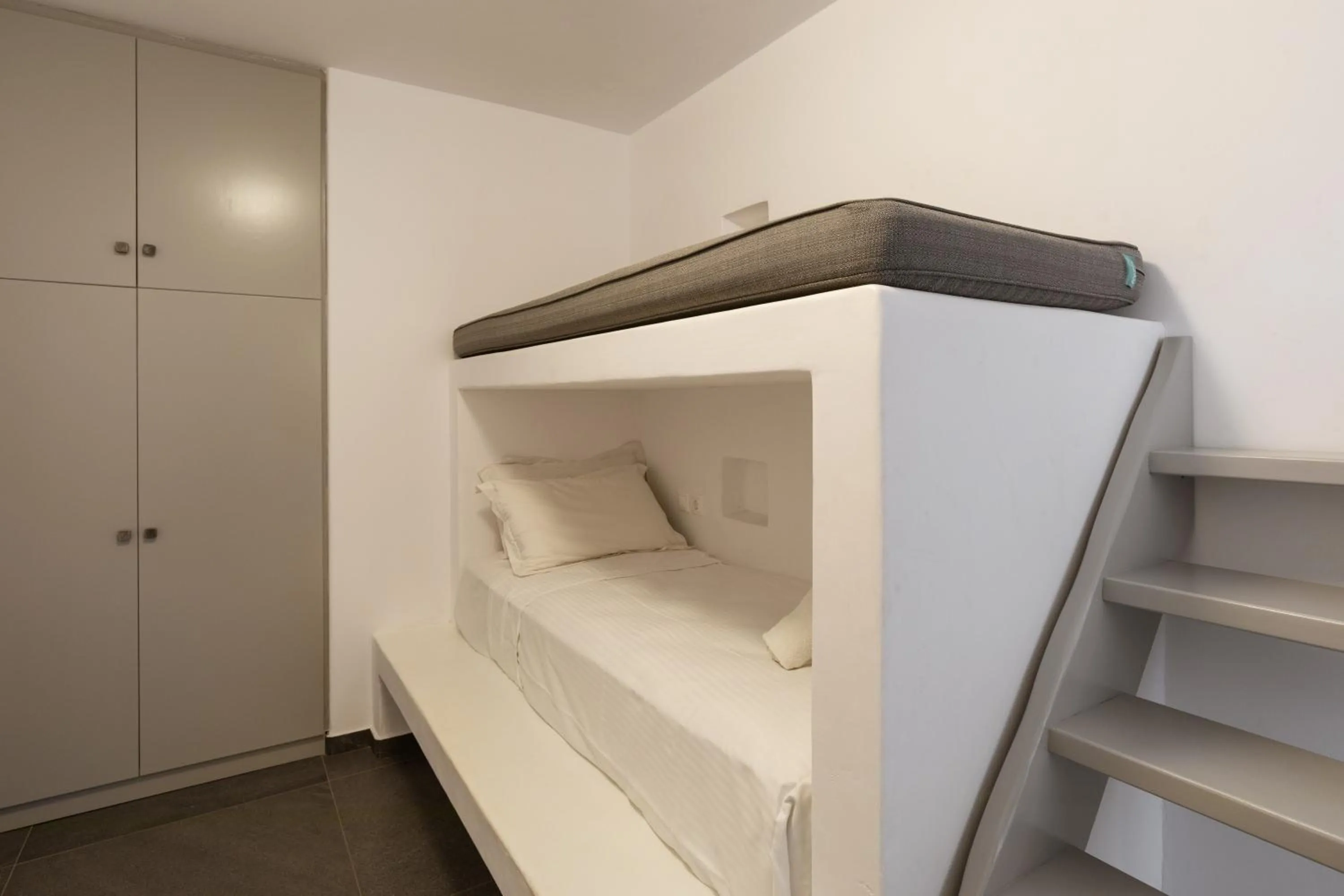 Bed in Aletro Cottage Houses