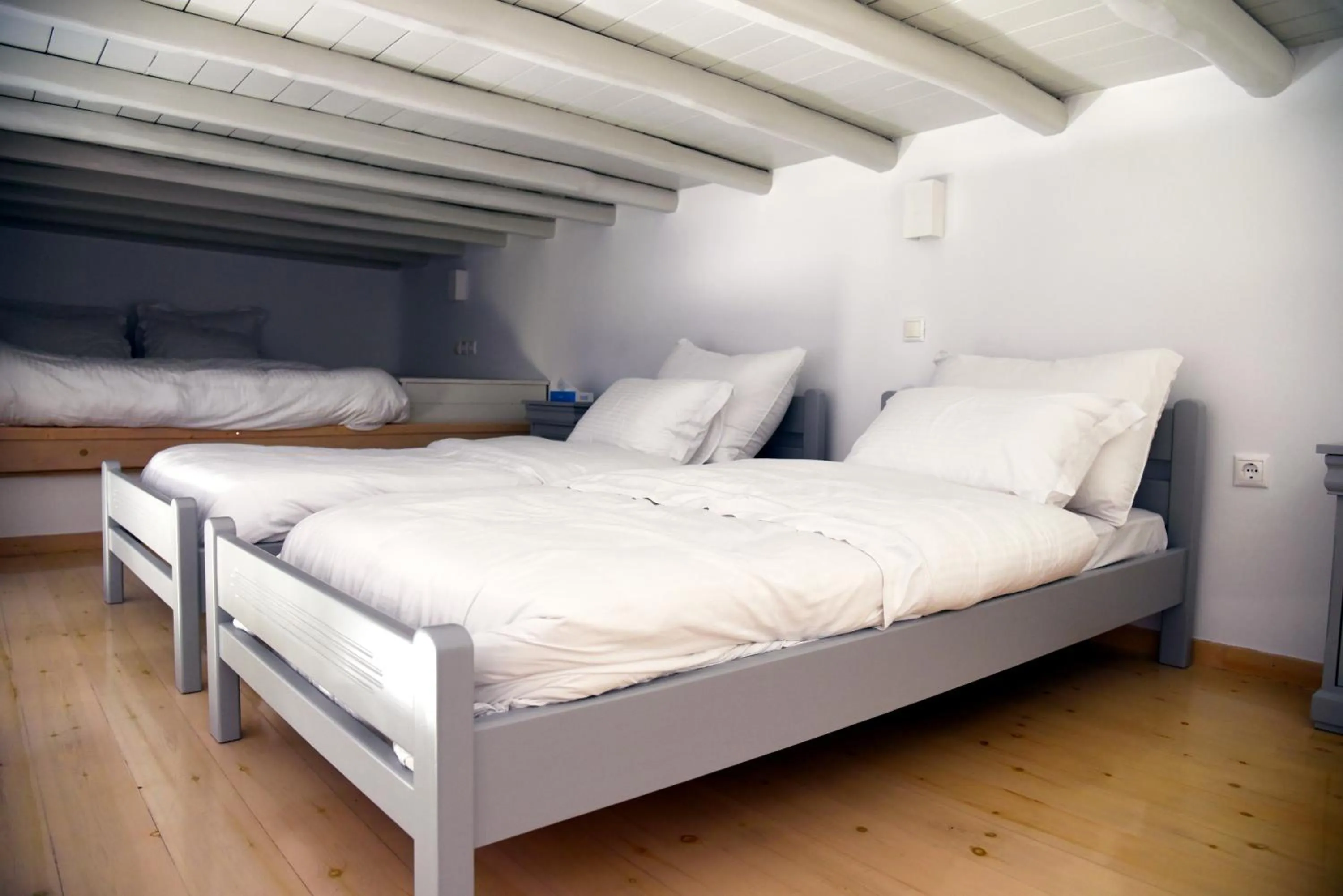 Bed in Aletro Cottage Houses