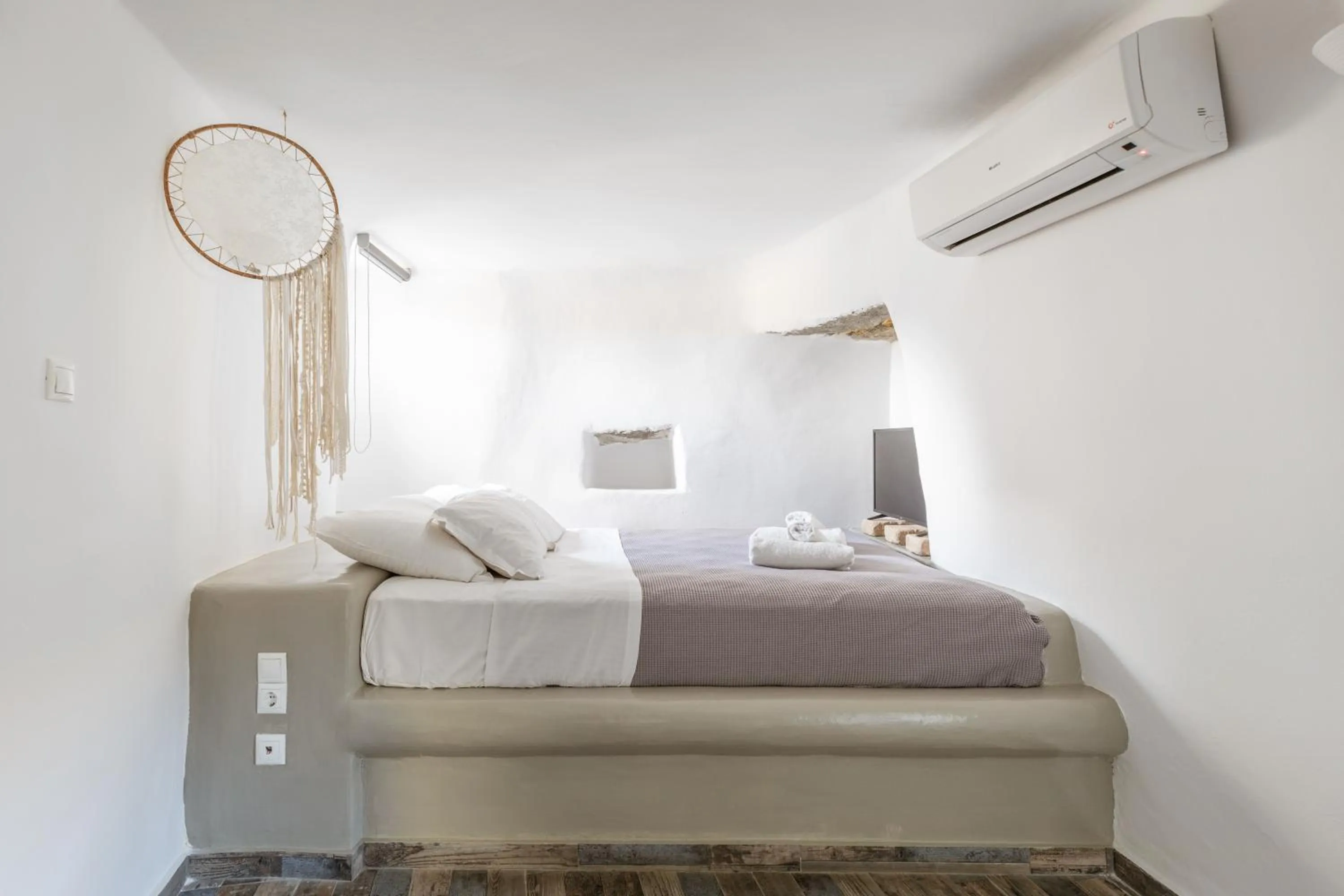 Bed in Aletro Cottage Houses