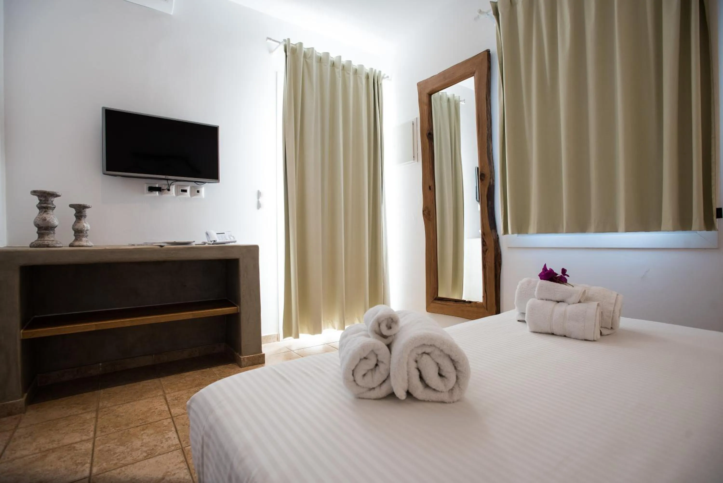 Bed in Aletro Cottage Houses