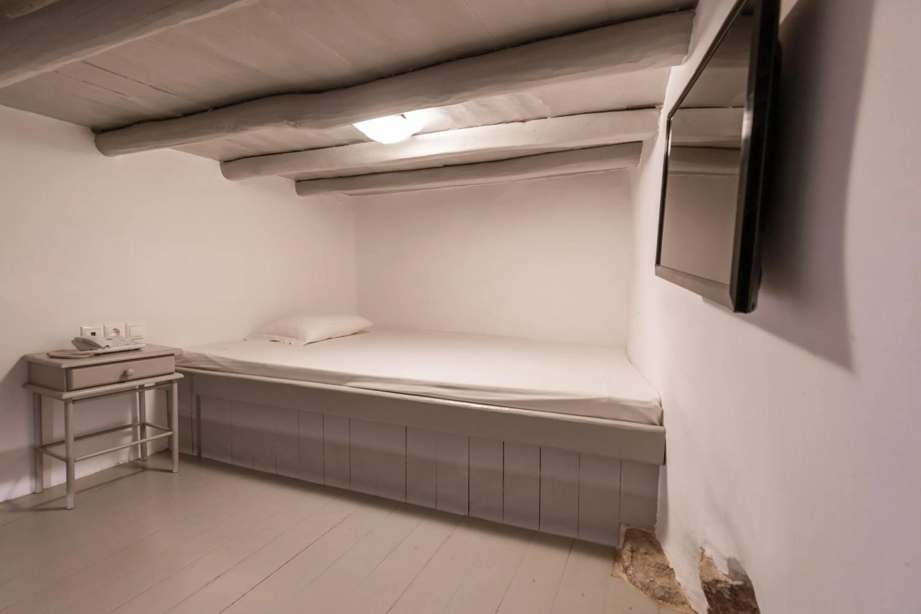 Bed in Aletro Cottage Houses