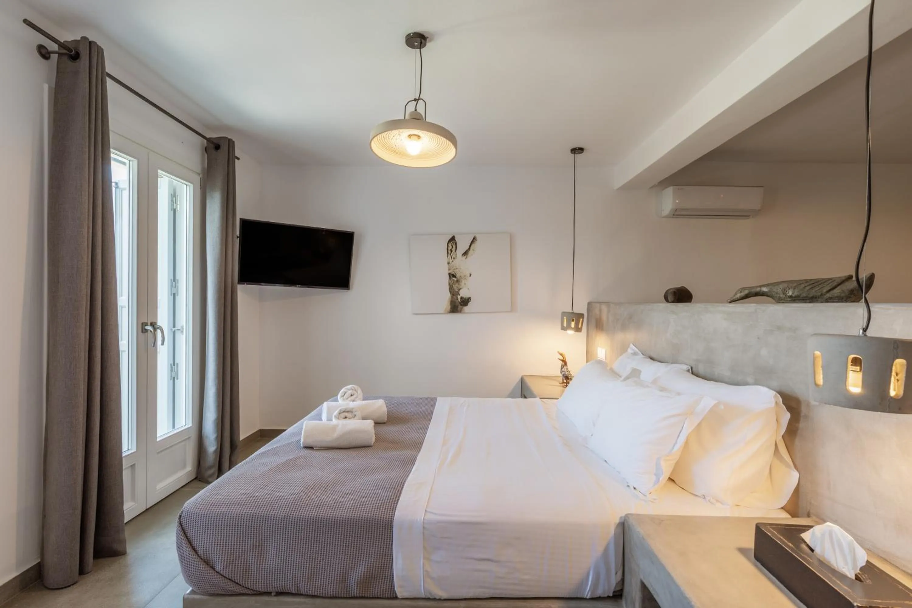 Bed in Aletro Cottage Houses