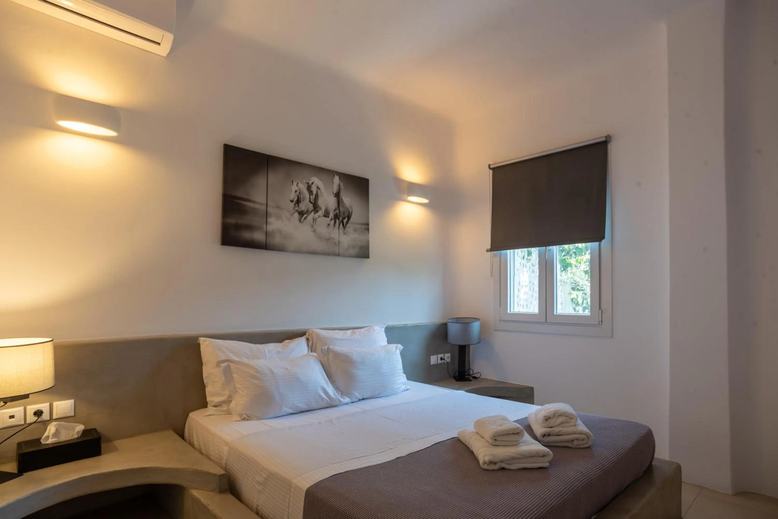 Bed in Aletro Cottage Houses