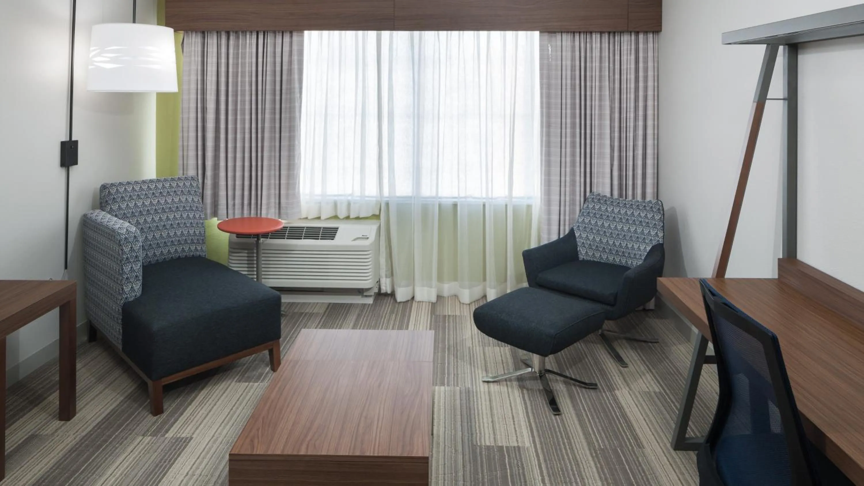 Photo of the whole room in Holiday Inn Express & Suites Orlando At SeaWorld by IHG - With Free Shuttle Service to SeaWorld Parks