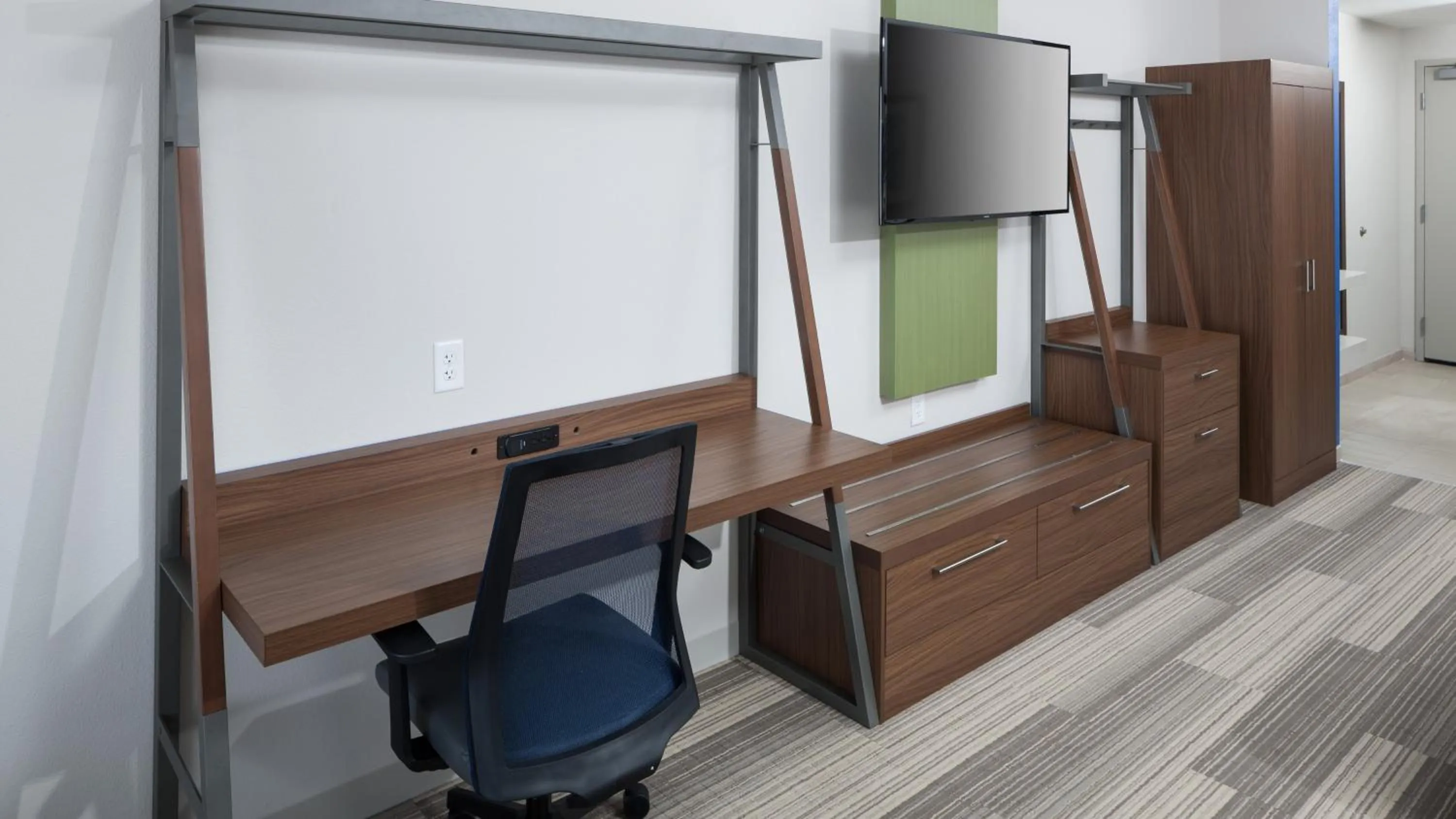 Photo of the whole room in Holiday Inn Express & Suites Orlando At SeaWorld by IHG - With Free Shuttle Service to SeaWorld Parks