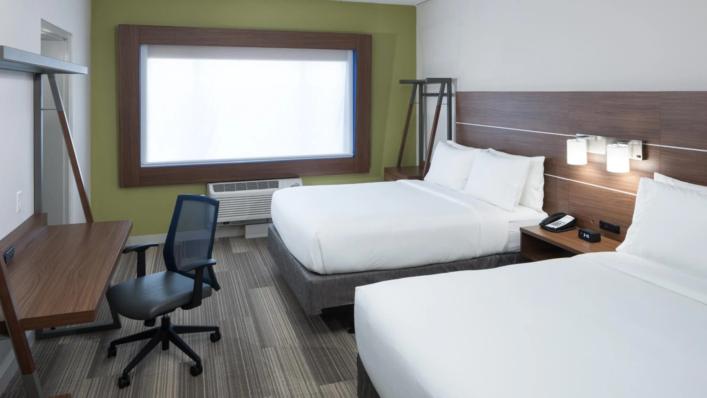 Photo of the whole room, Bed in Holiday Inn Express & Suites Orlando At SeaWorld by IHG - With Free Shuttle Service to SeaWorld Parks