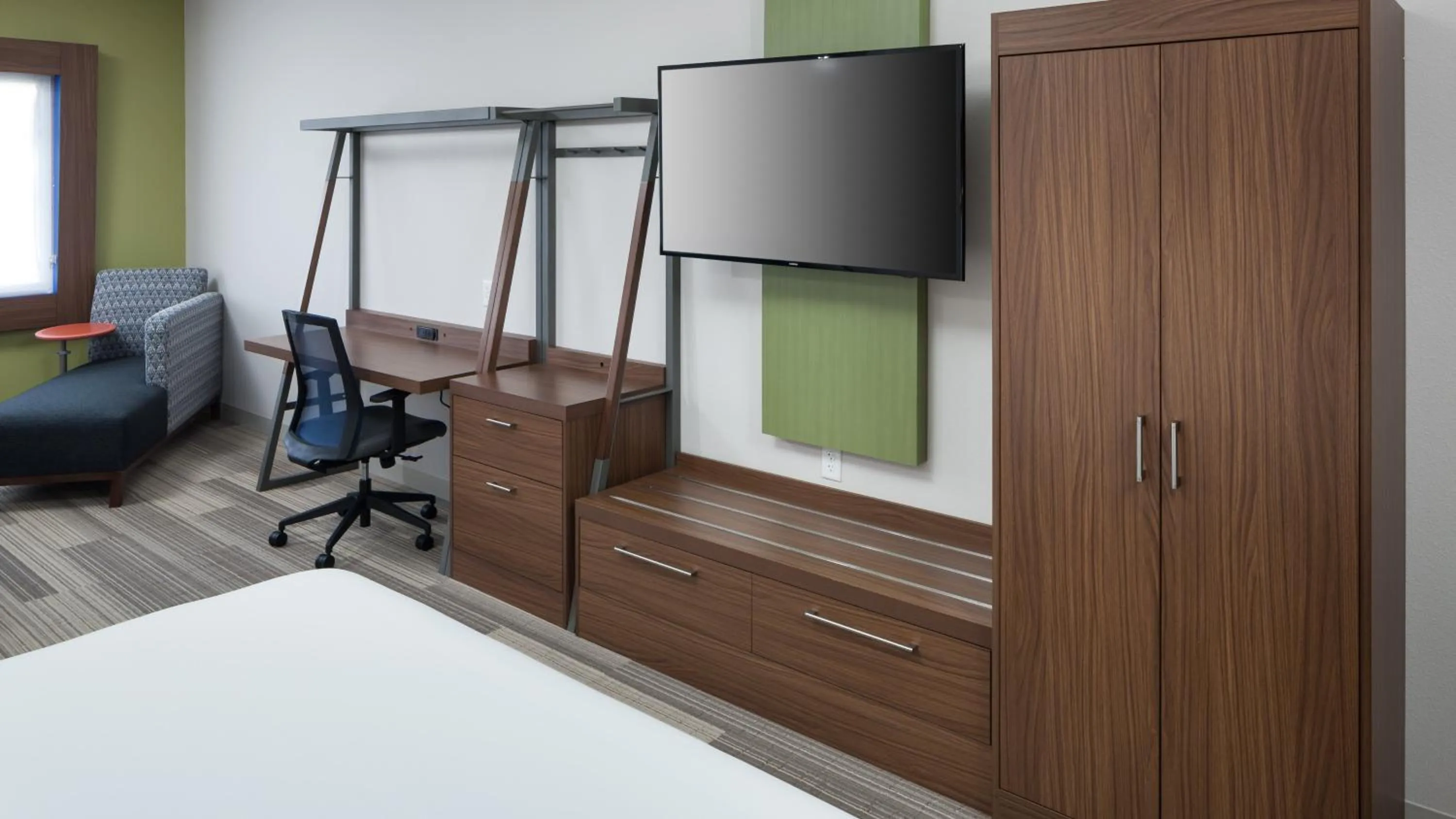 Photo of the whole room, Bed in Holiday Inn Express & Suites Orlando At SeaWorld by IHG - With Free Shuttle Service to SeaWorld Parks