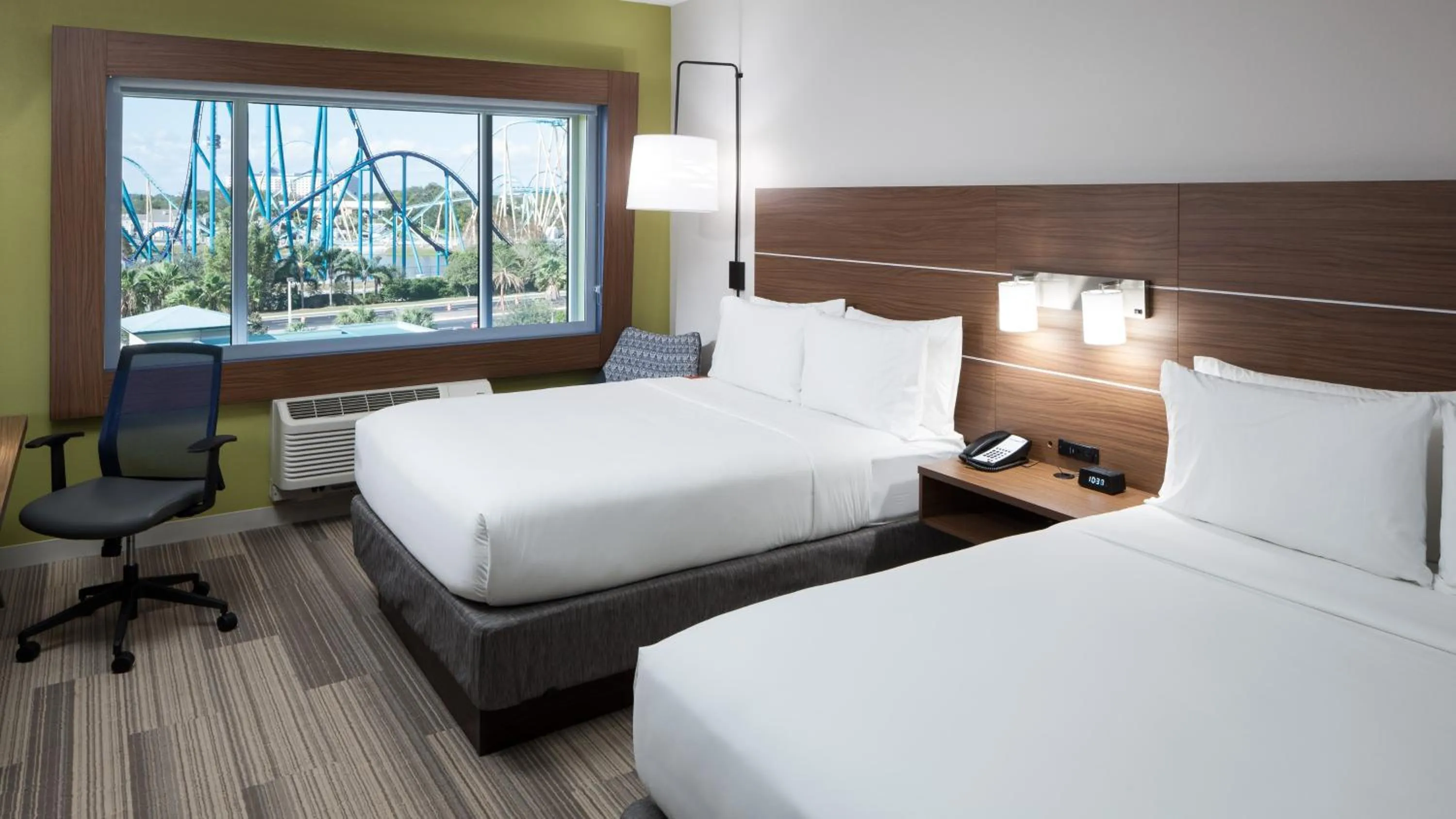 Photo of the whole room, Bed in Holiday Inn Express & Suites Orlando At SeaWorld by IHG - With Free Shuttle Service to SeaWorld Parks