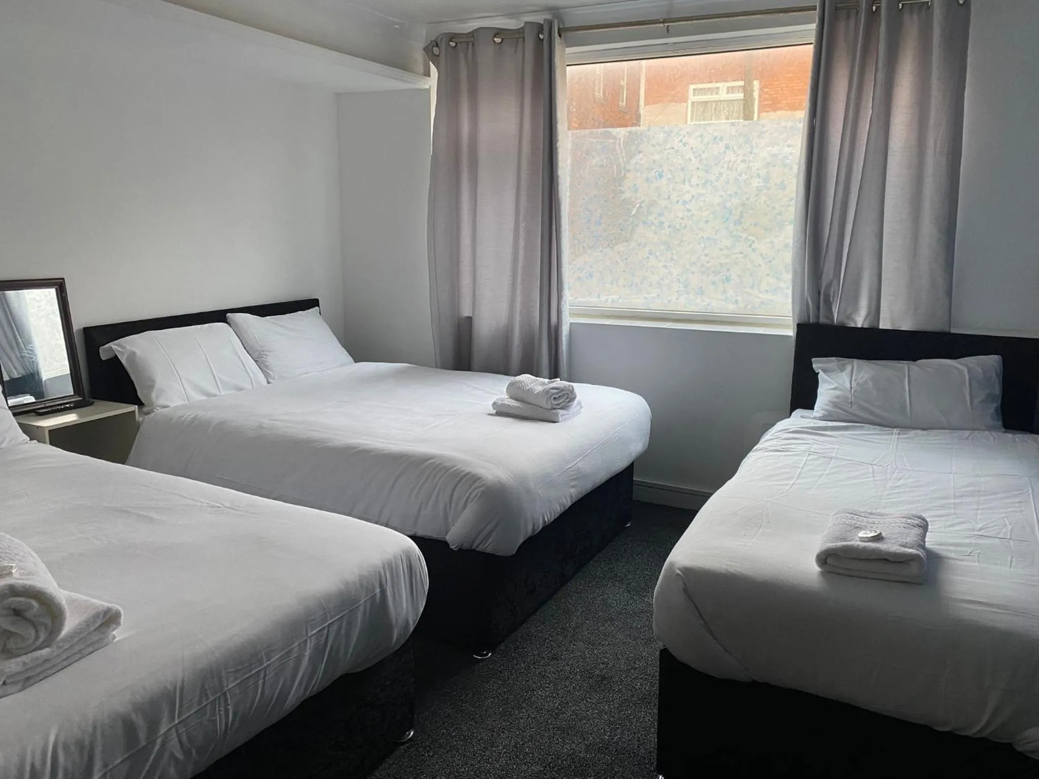 Photo of the whole room, Bed in The Regency Hotel