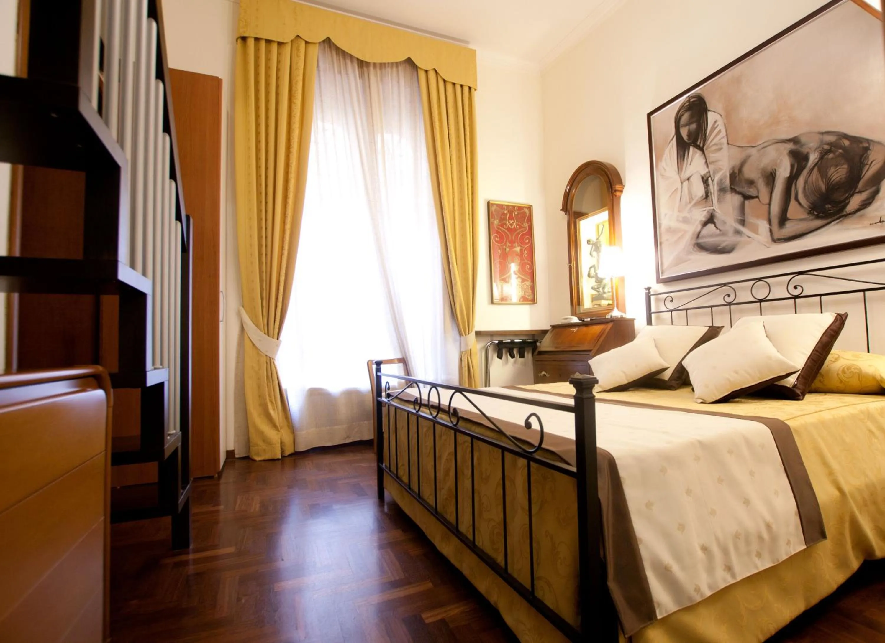 Photo of the whole room in Guesthouse Borromeo Roma