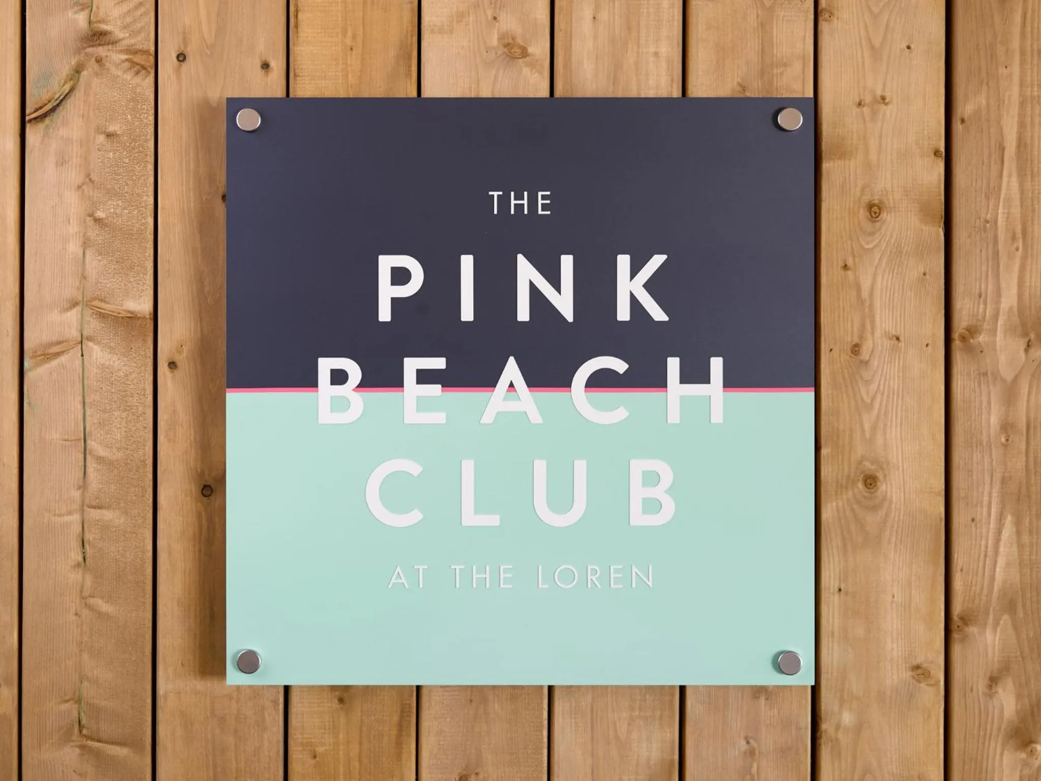 Property logo or sign in The Loren at Pink Beach