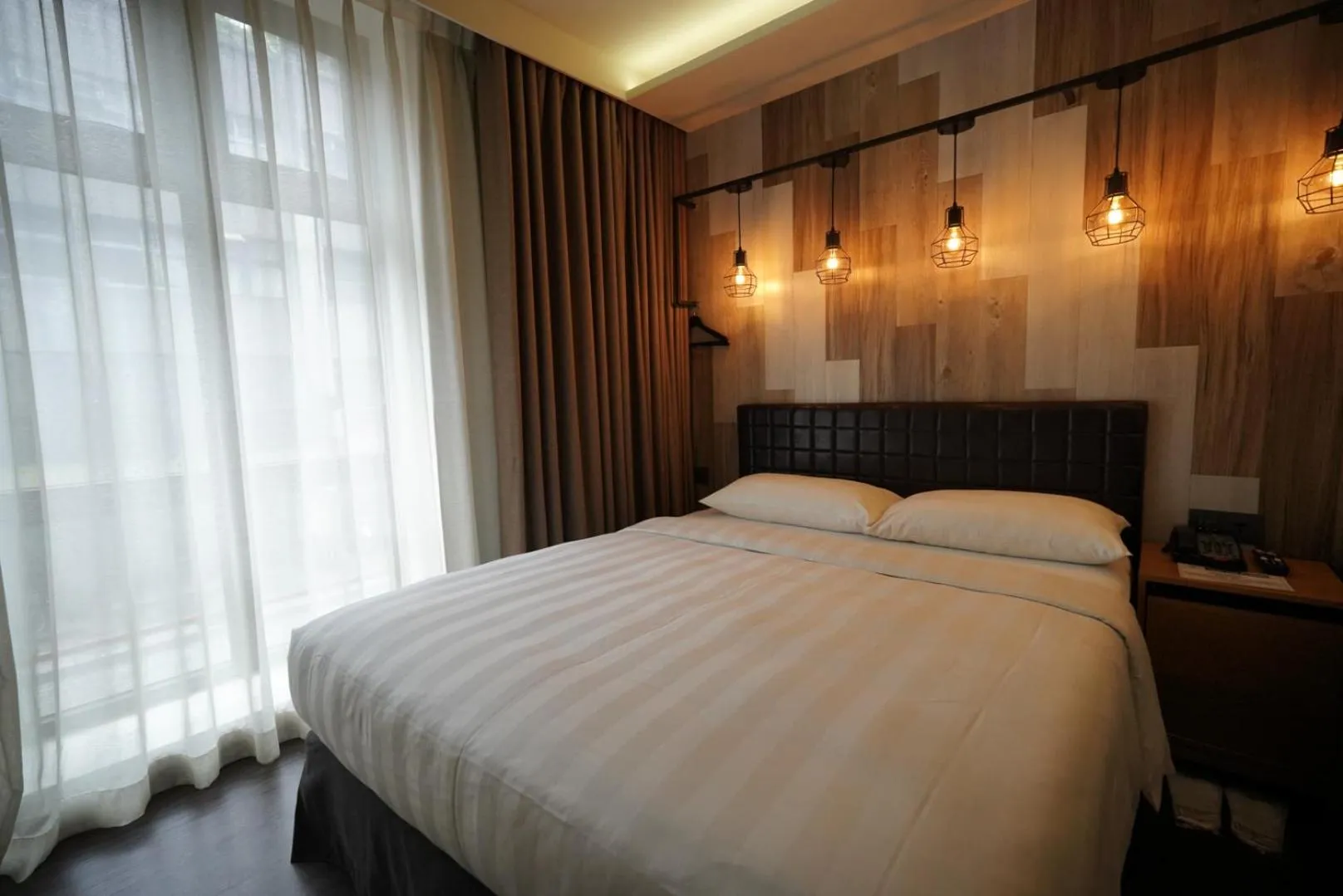 Photo of the whole room, Bed in City Suites - Beimen