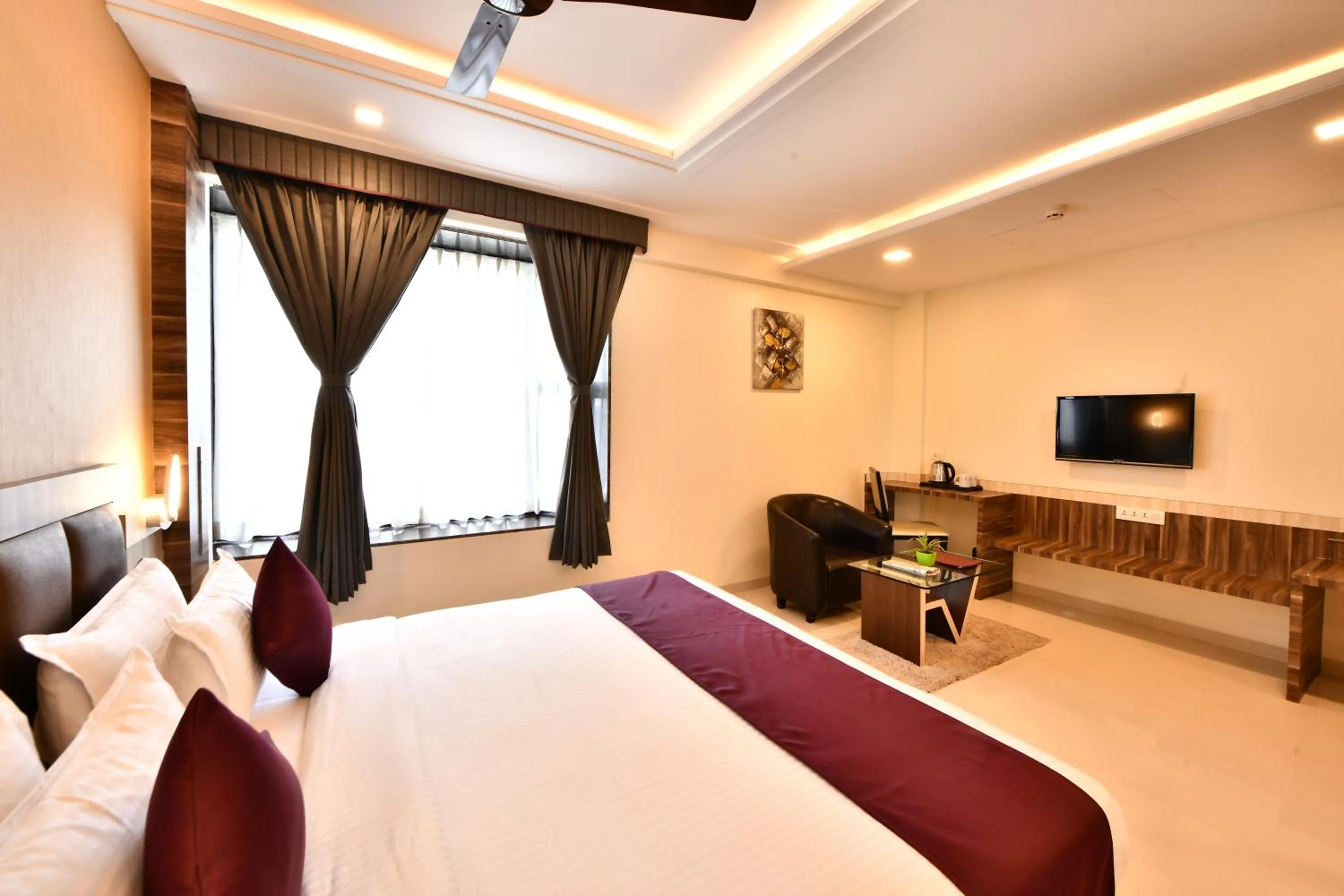 Bed in Click Hotel Sagar Plaza Chakan, Pune