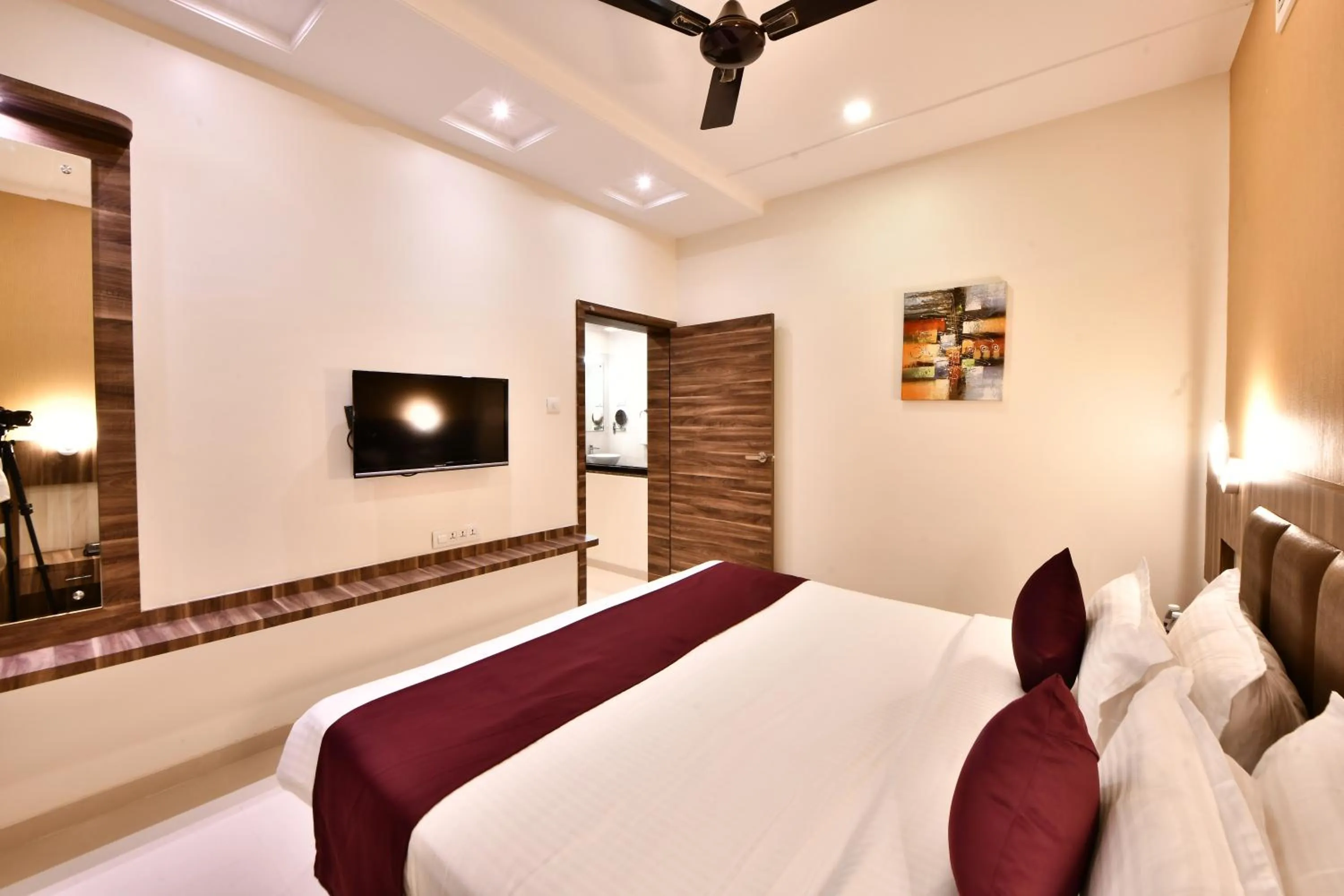 Photo of the whole room, Bed in Click Hotel Sagar Plaza Chakan, Pune