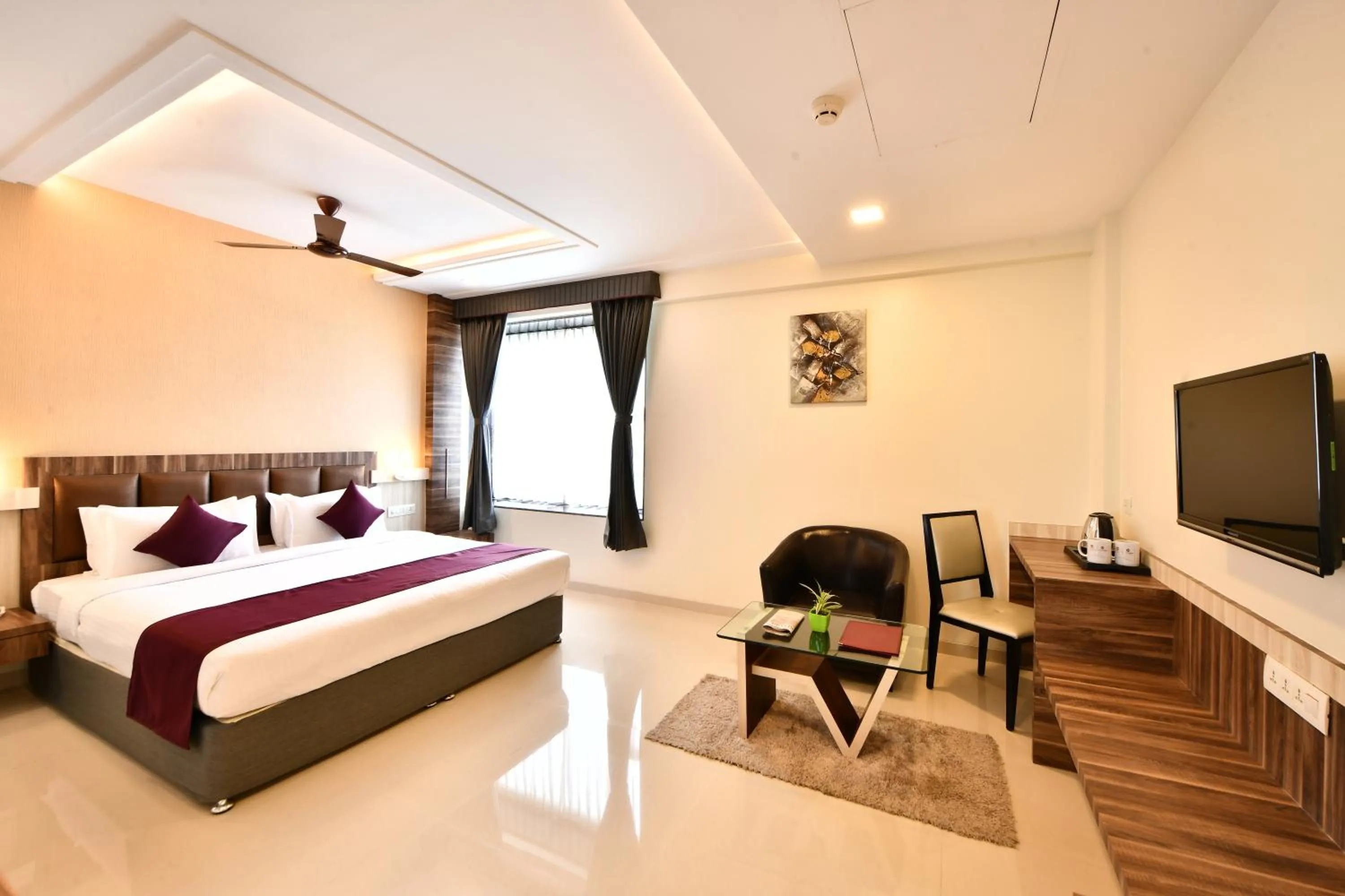 Photo of the whole room, Bed in Click Hotel Sagar Plaza Chakan, Pune